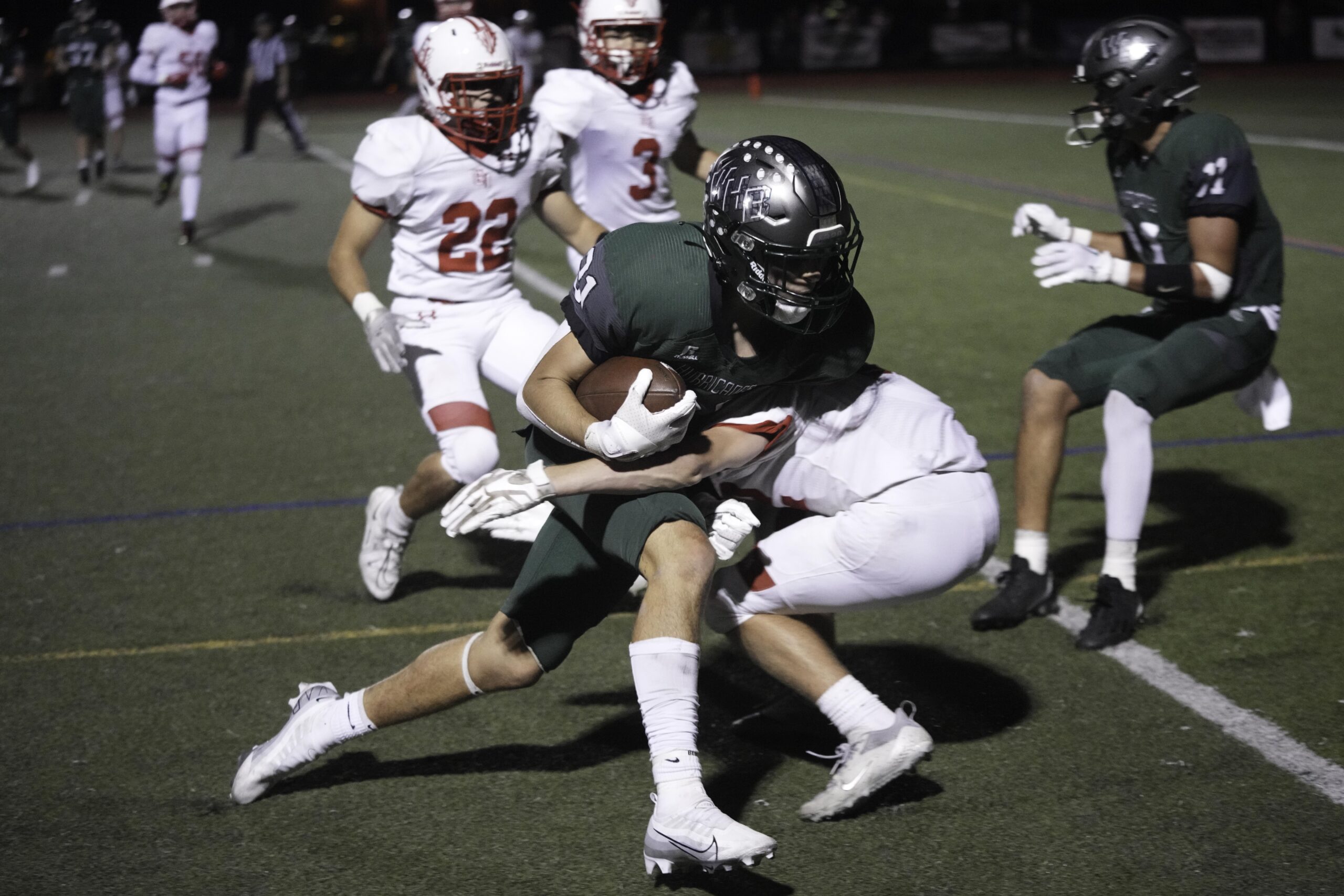 Westhampton Beach junior Brody Schaffer plows into an East Islip defender near the goal line.   RON ESPOSITO