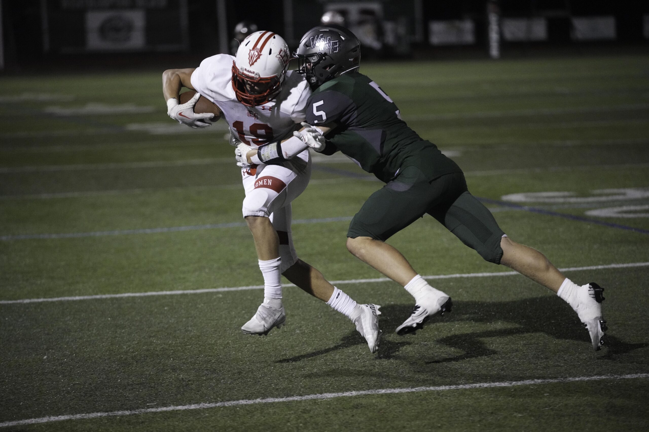 Westhampton Beach junior safety Riley Miller wraps up an East Islip player.    RON ESPOSITO