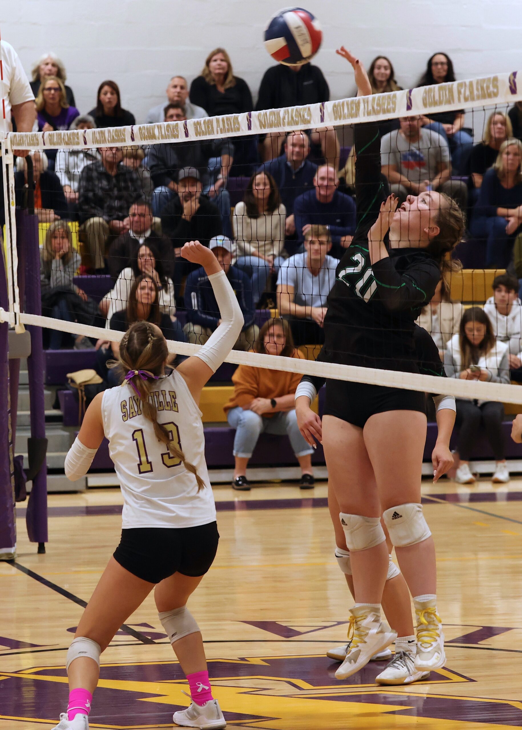 Senior middle blocker Sydney Anastasia with a solo block at the net. MICHAEL O'CONNOR