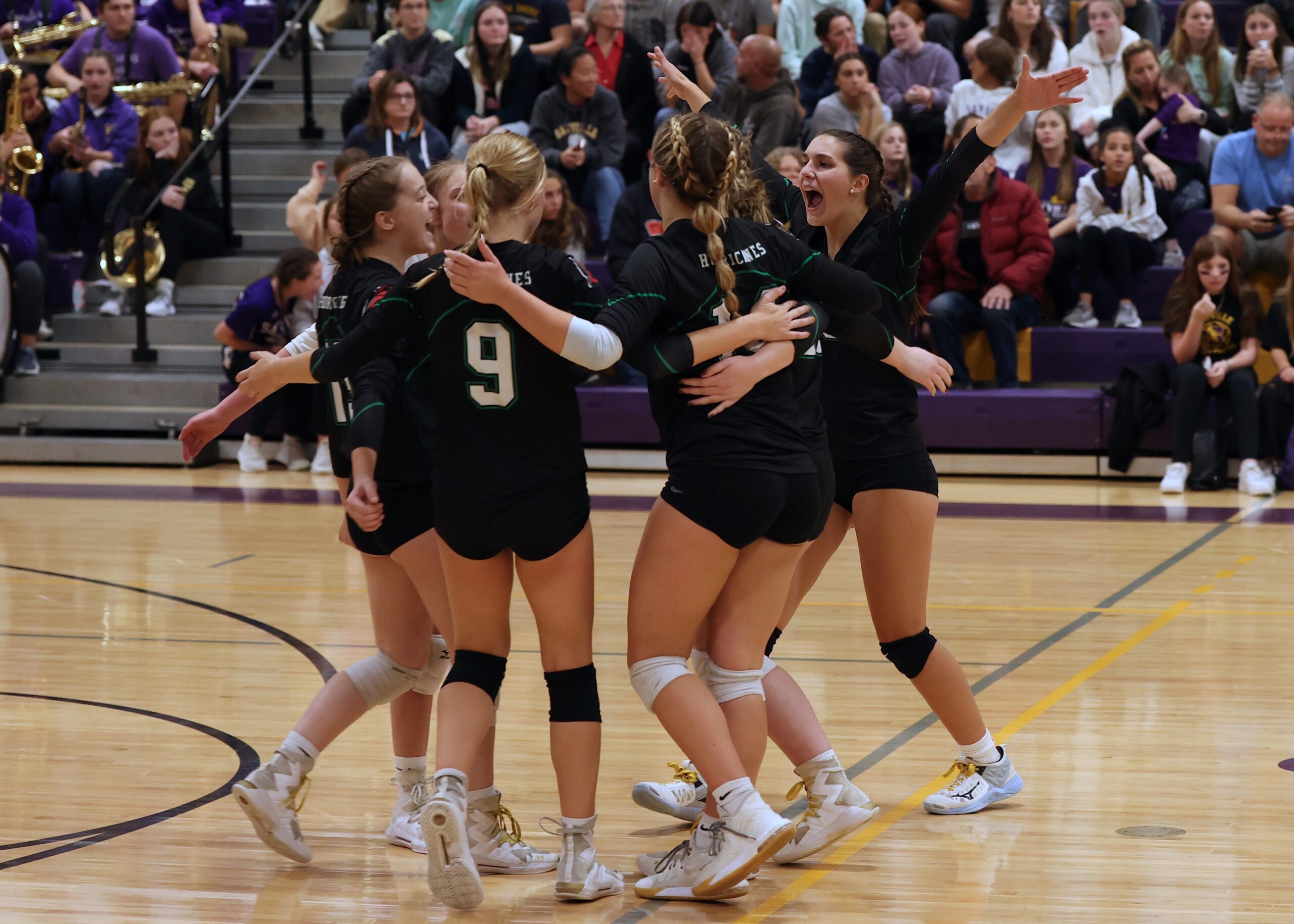 Westhampton Beach's girls volleyball team celebrates a point. MICHAEL O'CONNOR