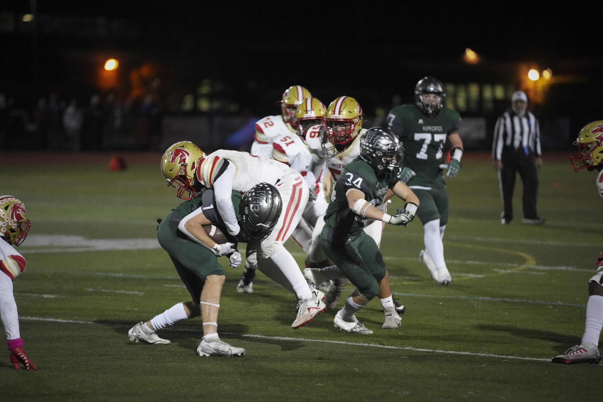 Westhampton Beach junior Kevin Smith tries to shake a Hills West defender.    RON ESPOSITO