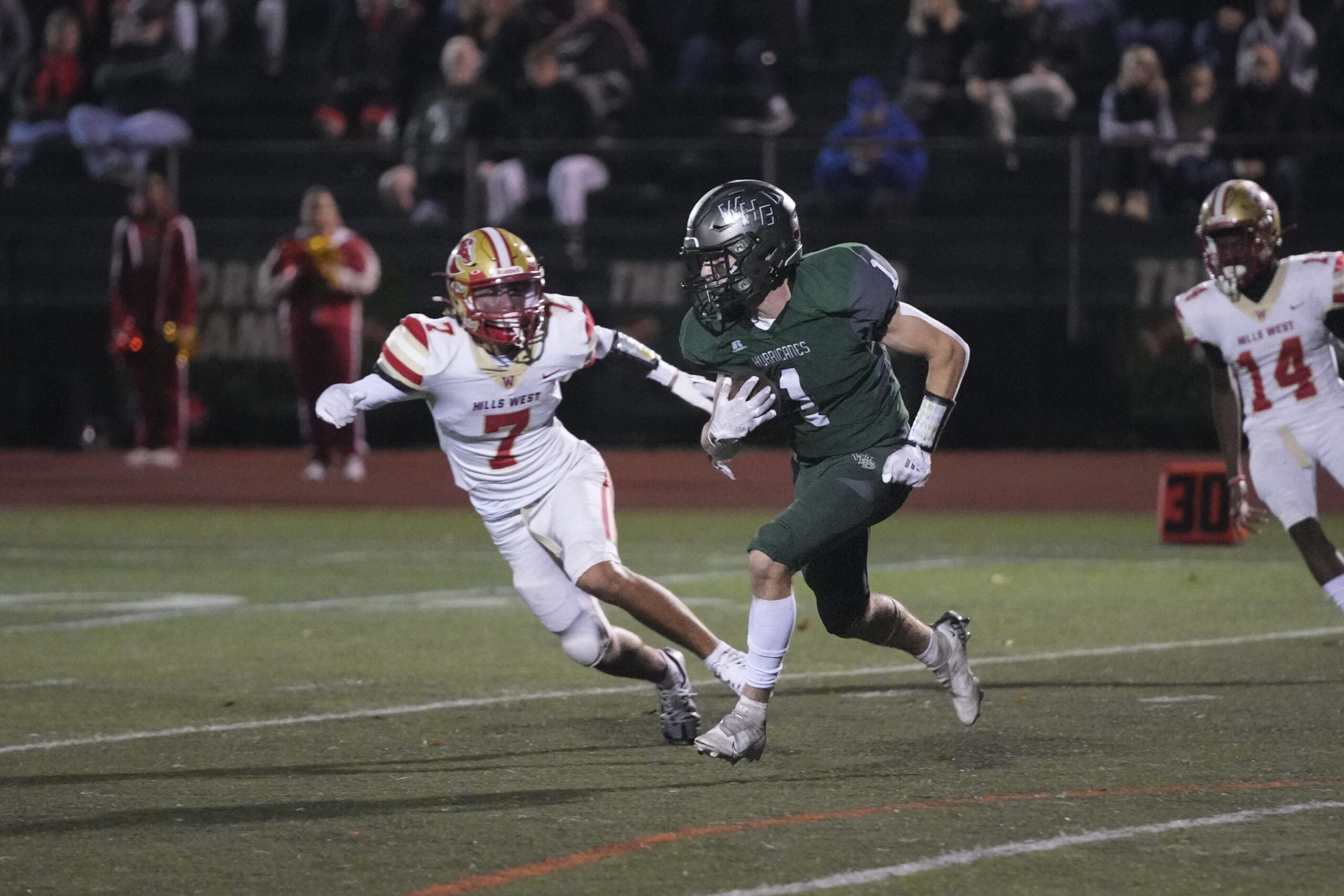 Westhampton Beach junior Kevin Smith looks to avoid a Hills West defender.    RON ESPOSITO