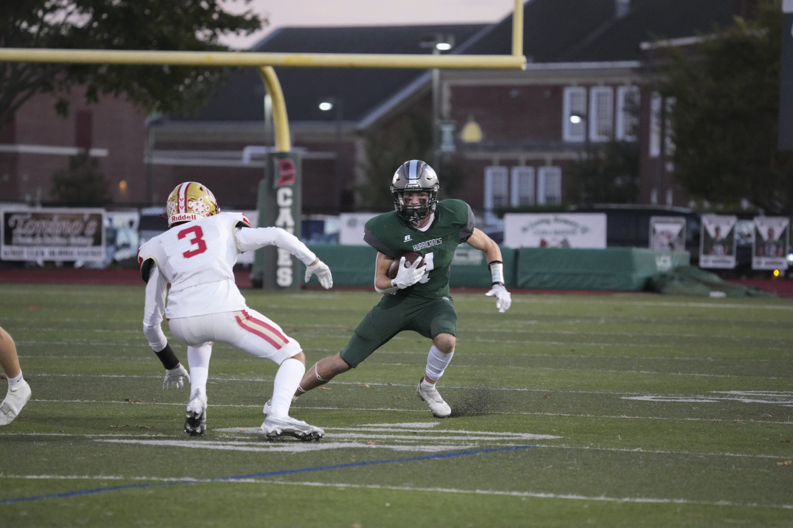 Westhampton Beach junior Kevin Smith tries to make a Hills West defender miss.    RON ESPOSITO