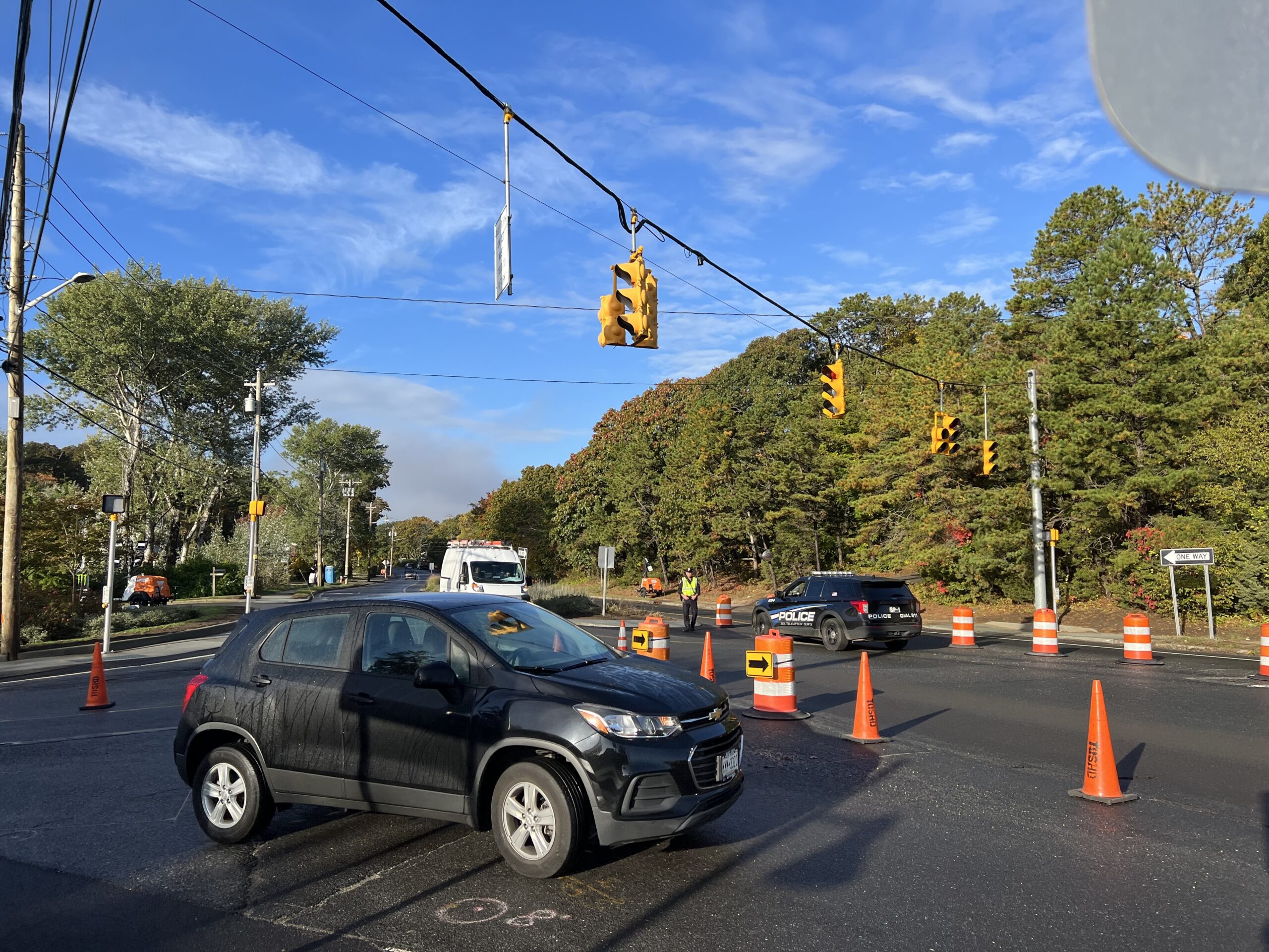 The pilot traffic program runs this week through Friday. Lights at key intersections, like Canoe Place Road in Hampton Bays, will be set to flash yellow to allow for uninterrupted flow for commuters on main arteries.    DANA SHAW