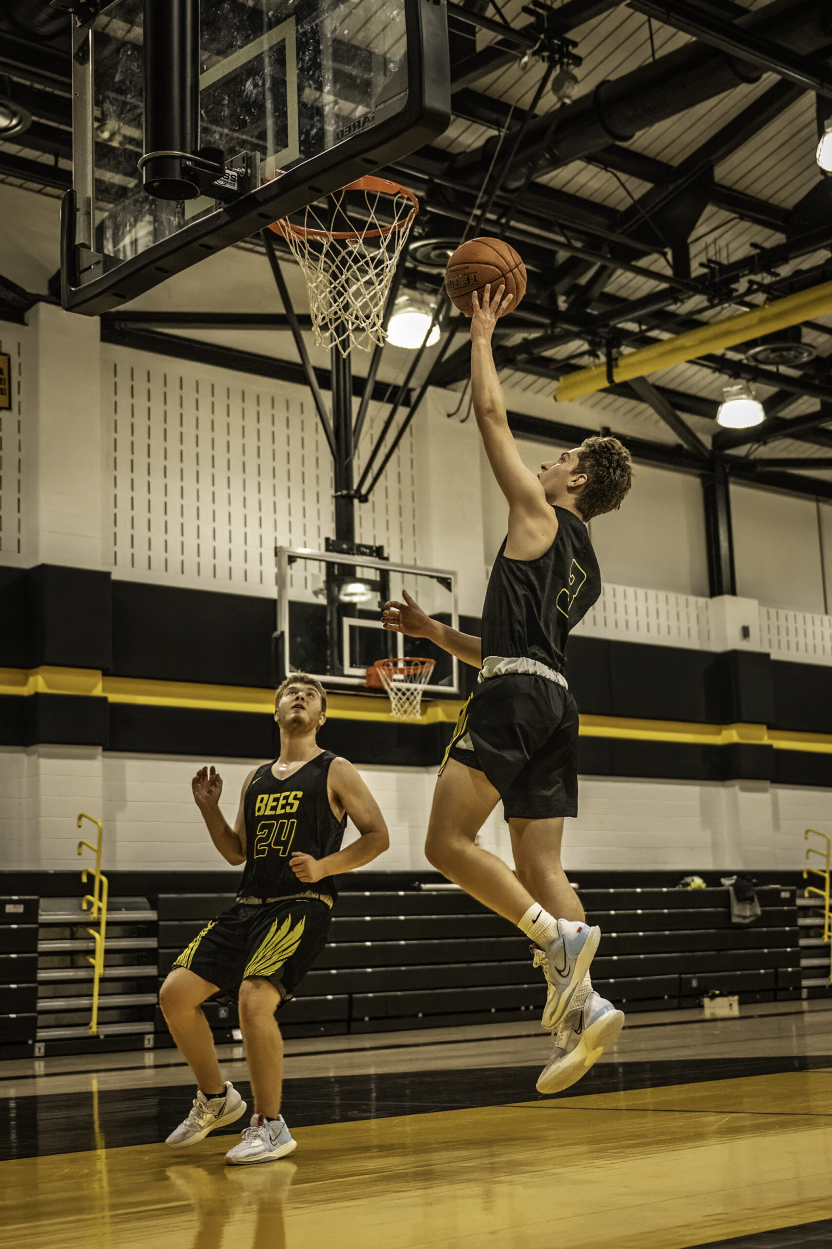 Senior Kris Vinski with a layup in Monday's practice.   MARIANNE BARNETT