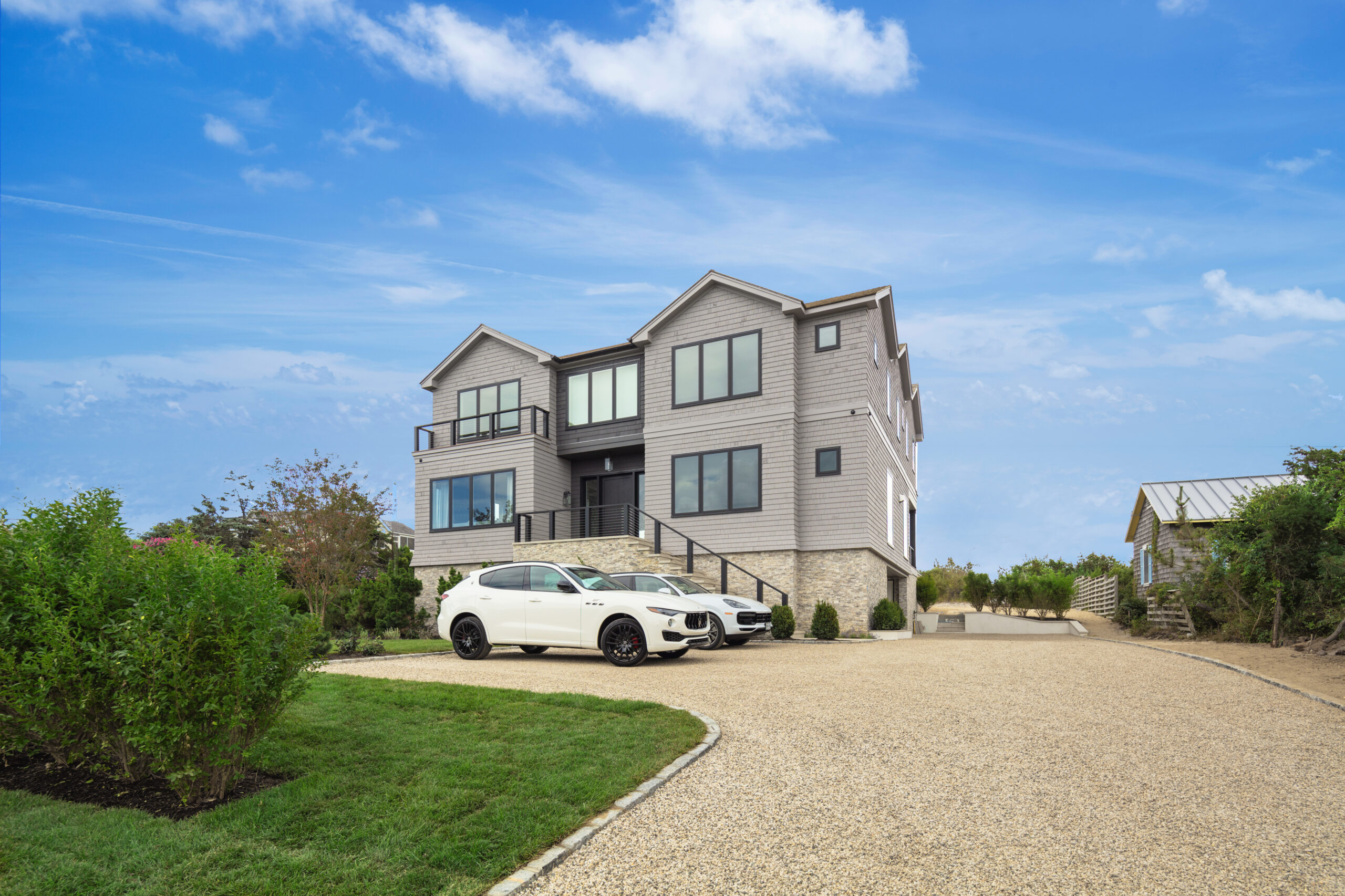The new build by George Vickers at 98 Dune Road in Quogue sold for $11.75 million.  LPG/COURTESY DOUGLAS ELLIMAN