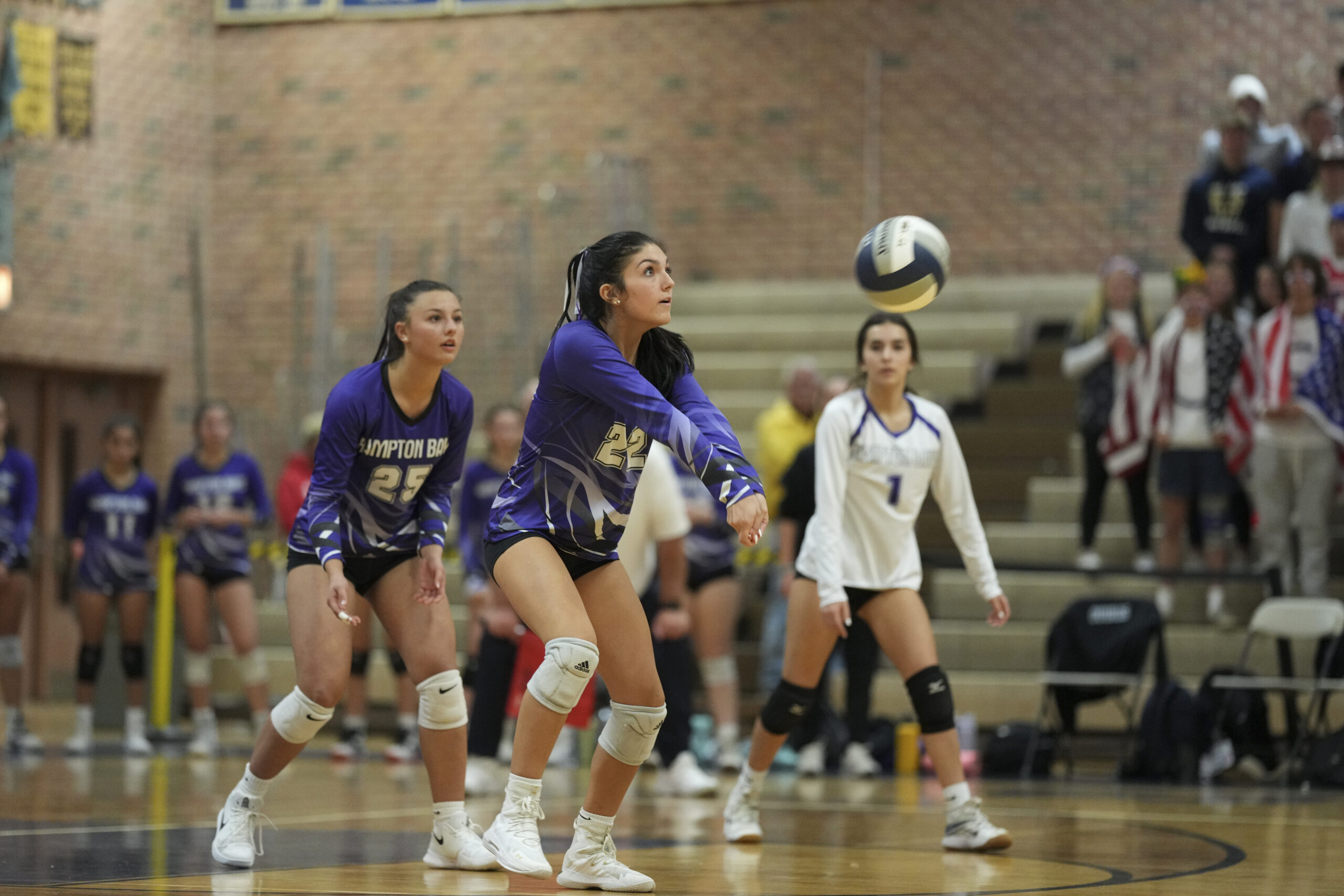Hampton Bays junior Tania Quiros is on the spot for a dig.    RON ESPOSITO