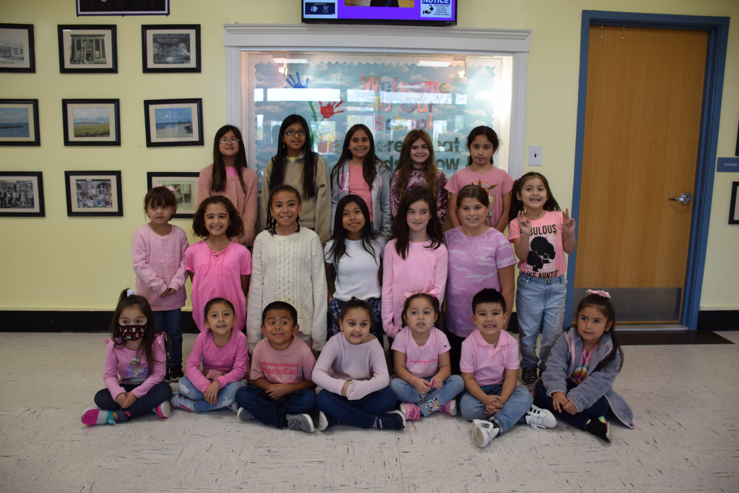 The members of the Hampton Bays Elementary School service organization K-Kids recently donated $250 to the American Cancer Society as part of their annual Breast Cancer Awareness fundraiser. They raised the funds by selling breast cancer awareness bracelets and pins to fellow students, teachers and administrators. Students and staff also wore the color pink on October 28 in honor of the cause. COURTESY HAMPTON BAYS SCHOOL DISTRICT