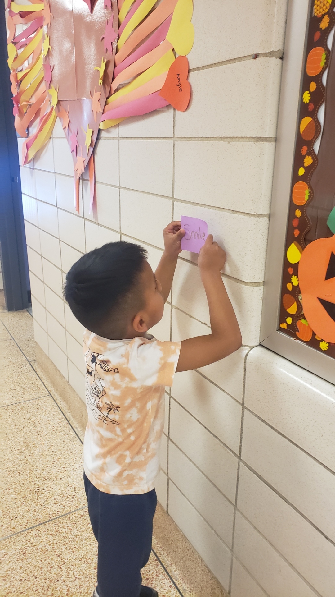 In honor of World Kindness Day, Hampton Bays Elementary School students in Becky Yakaboski’s class, including Erik Tenesaca Pacho, promoted positivity and kindness by sharing hundreds of Post-it notes around their school. The students wrote positive affirmations and created cheerful pictures to share as a surprise for their peers. COURTESY HAMPTON BAYS SCHOOL DISTRICT