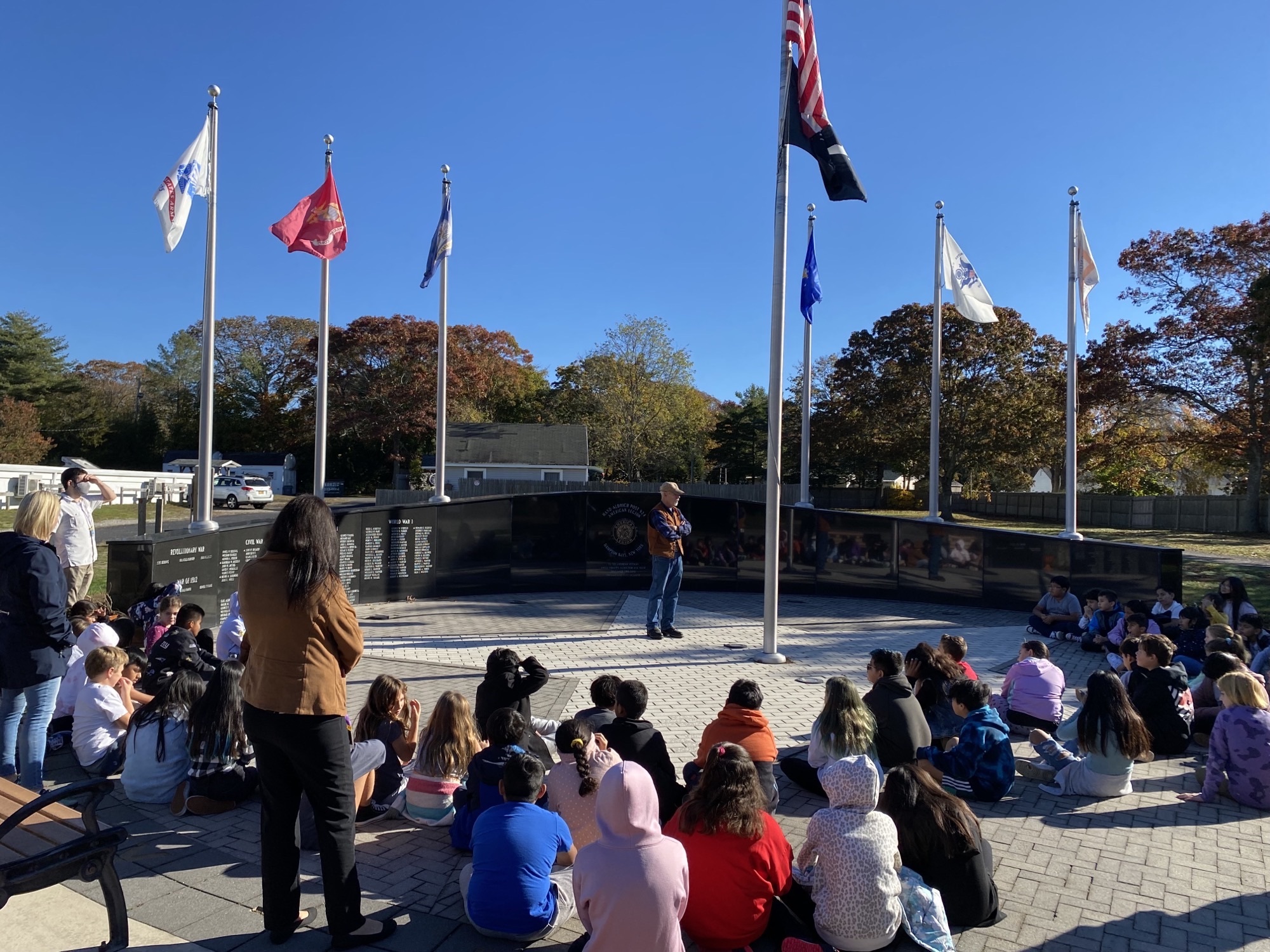 As part of their social studies curriculum, Hampton Bays Elementary School fourth grade students recently visited the American Legion Post 924. During the tour, the students heard from local veterans about the history of Veterans Day and the flags flown at the legion. COURTESY HAMPTON BAYS SCHOOL DISTRICT