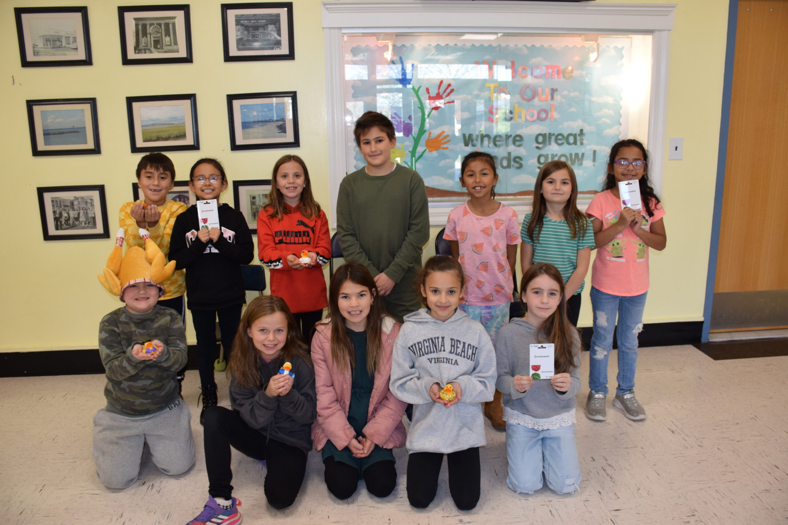 The members of the Hampton Bays Elementary School service organization K-Kids recently donated $200 toward their school’s PTA Thanksgiving fundraiser that provides gift cards for families in need to purchase Thanksgiving dinners. They raised the funds by selling rubber ducks during their lunch period to peers and teachers. COURTESY HAMPTON BAYS SCHOOL DISTRICT