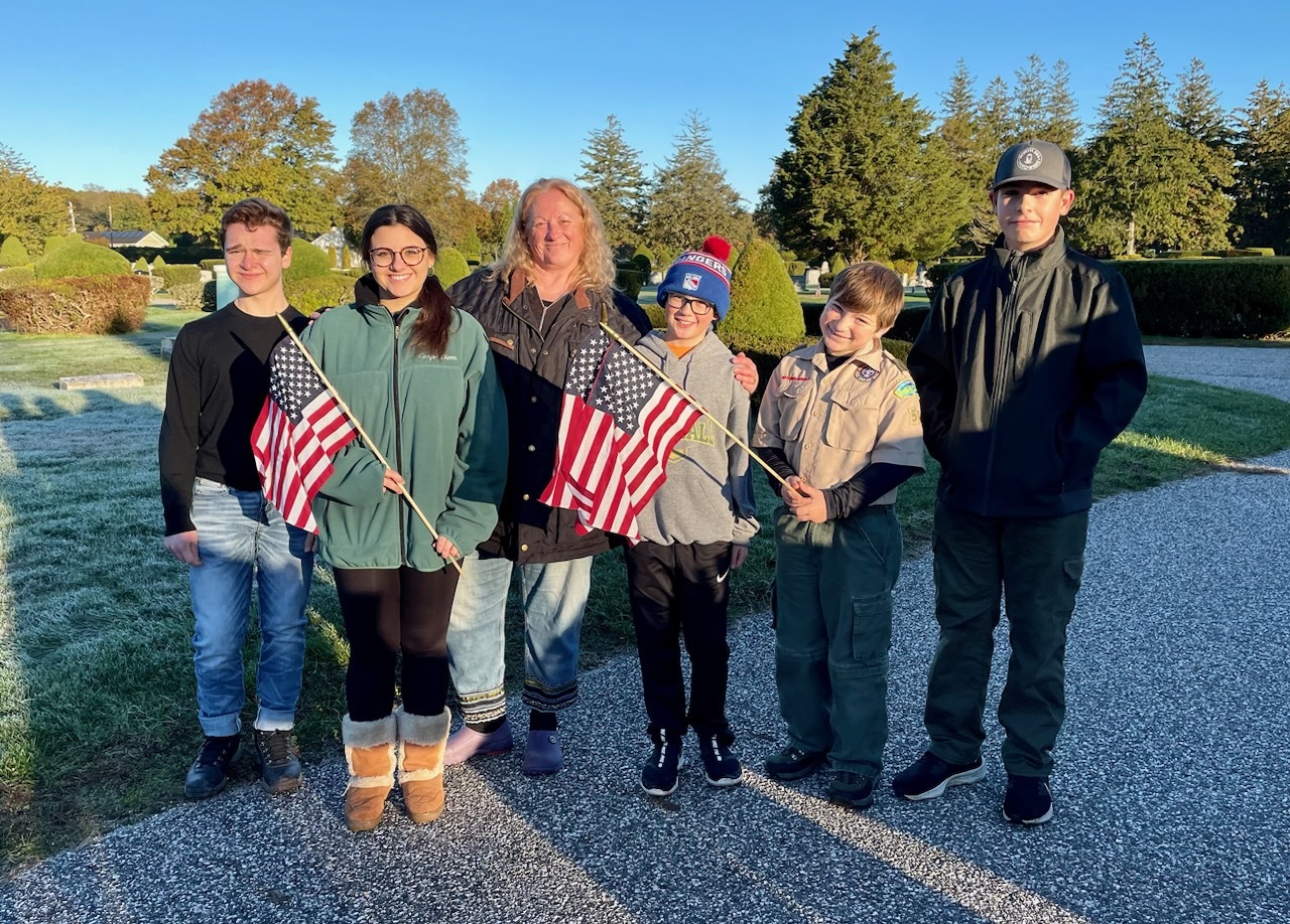In honor of Veterans Day, members of Southampton High School’s Mariners Patriot Club, along with local Scouts and veteran organizations, continued their tradition of placing 1,200 flags on the graves of veterans at Sacred Hearts and Southampton cemeteries. The flags will be collected by the volunteers after Veterans Day. COURTESY SOUTHAMPTON SCHOOL DISTRICT