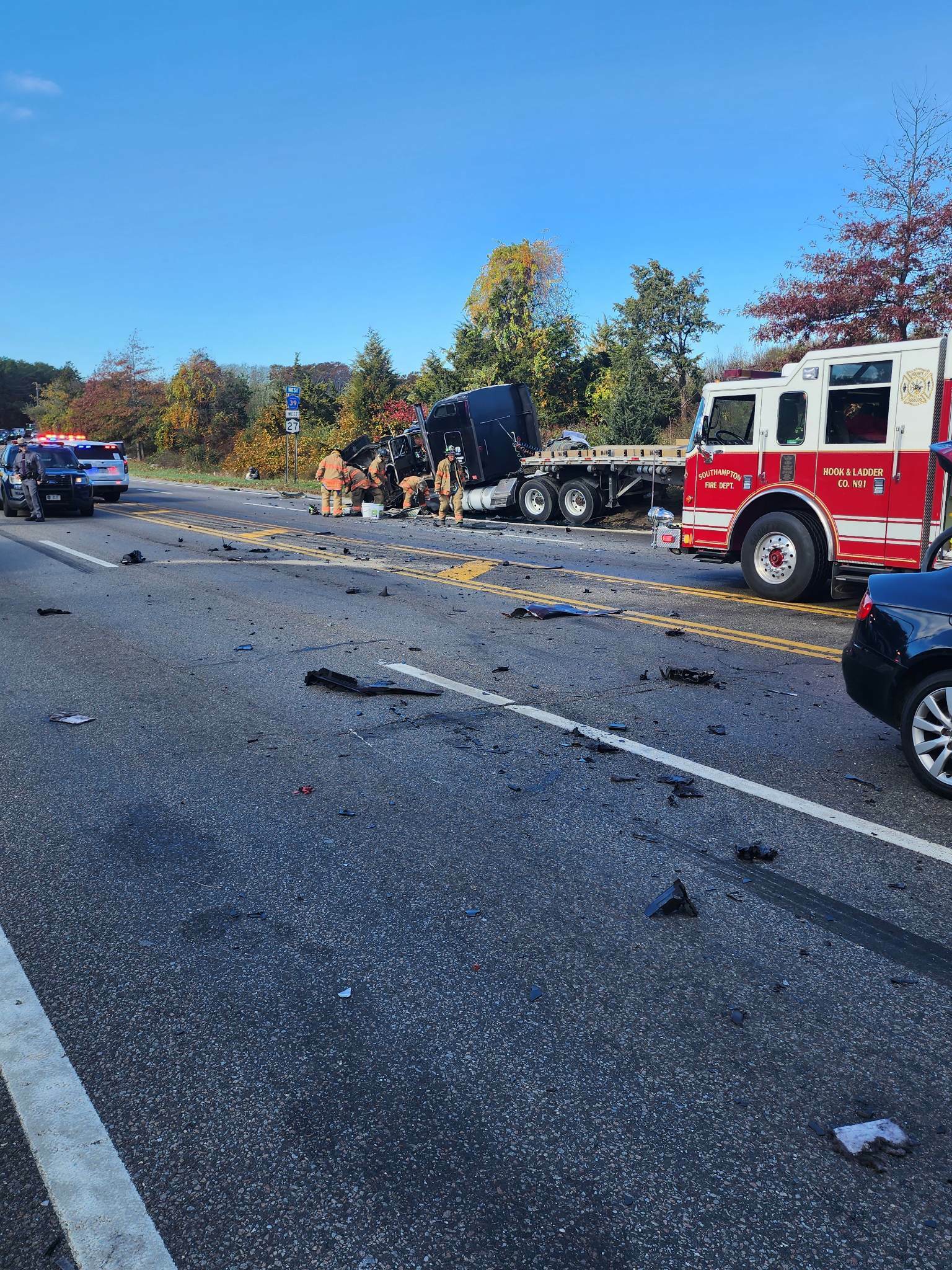 Debris from the wreckage scattered across County Road 39 following the multi-car crash in Southampton.    COURTESY LAMAR ROBINSON
