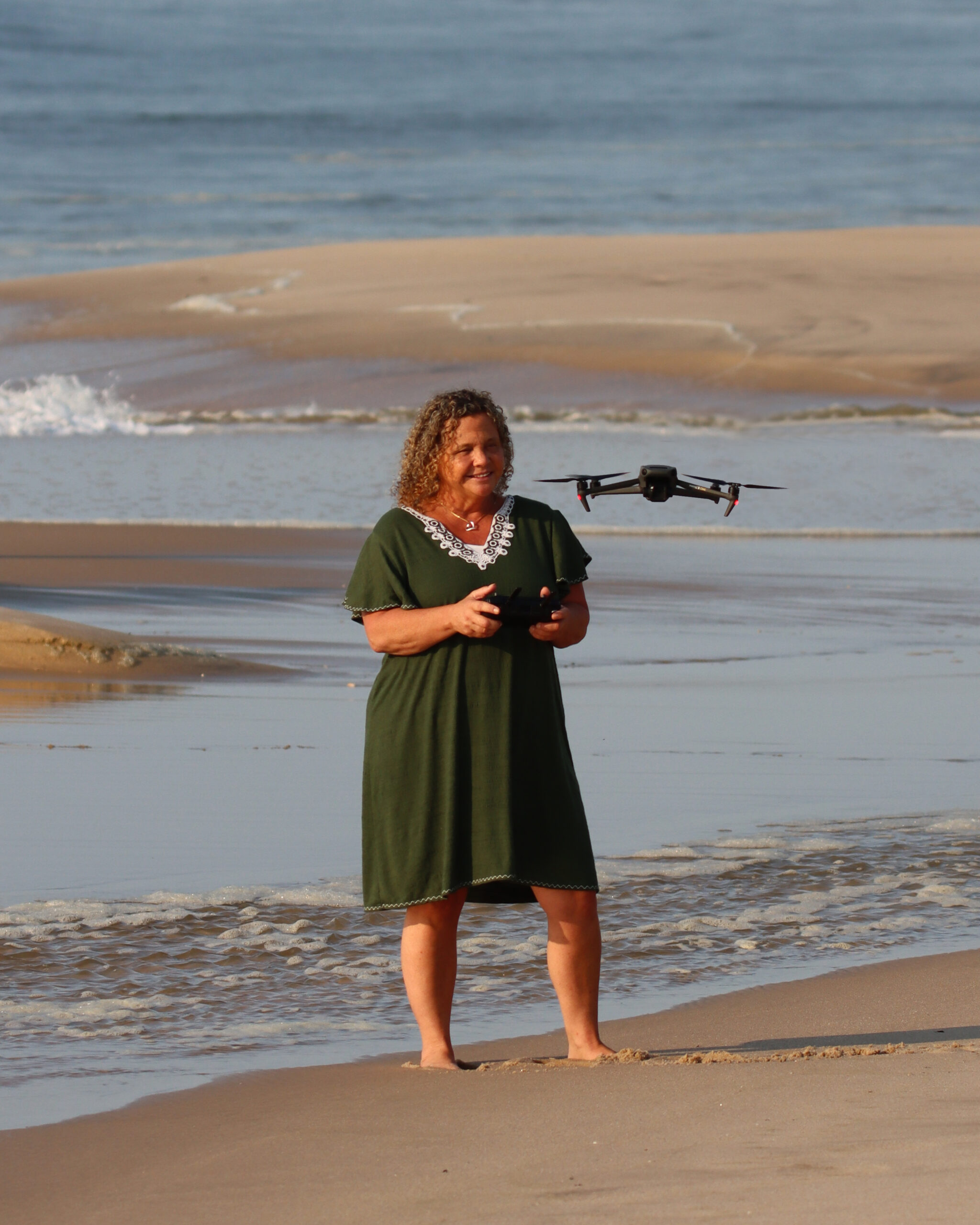 Joanna Steidle flies her drone at the beach.