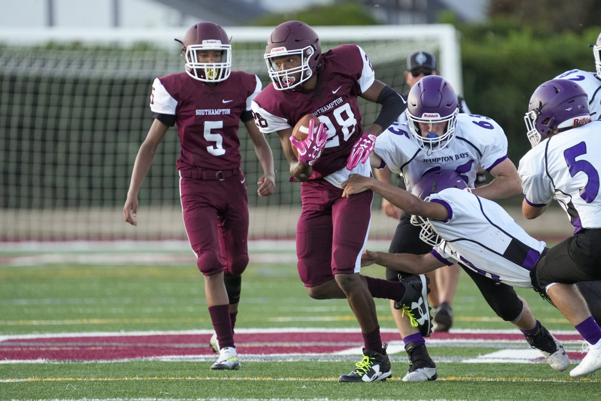 Naevon Jenkins breaks a tackle. RON ESPOSITO