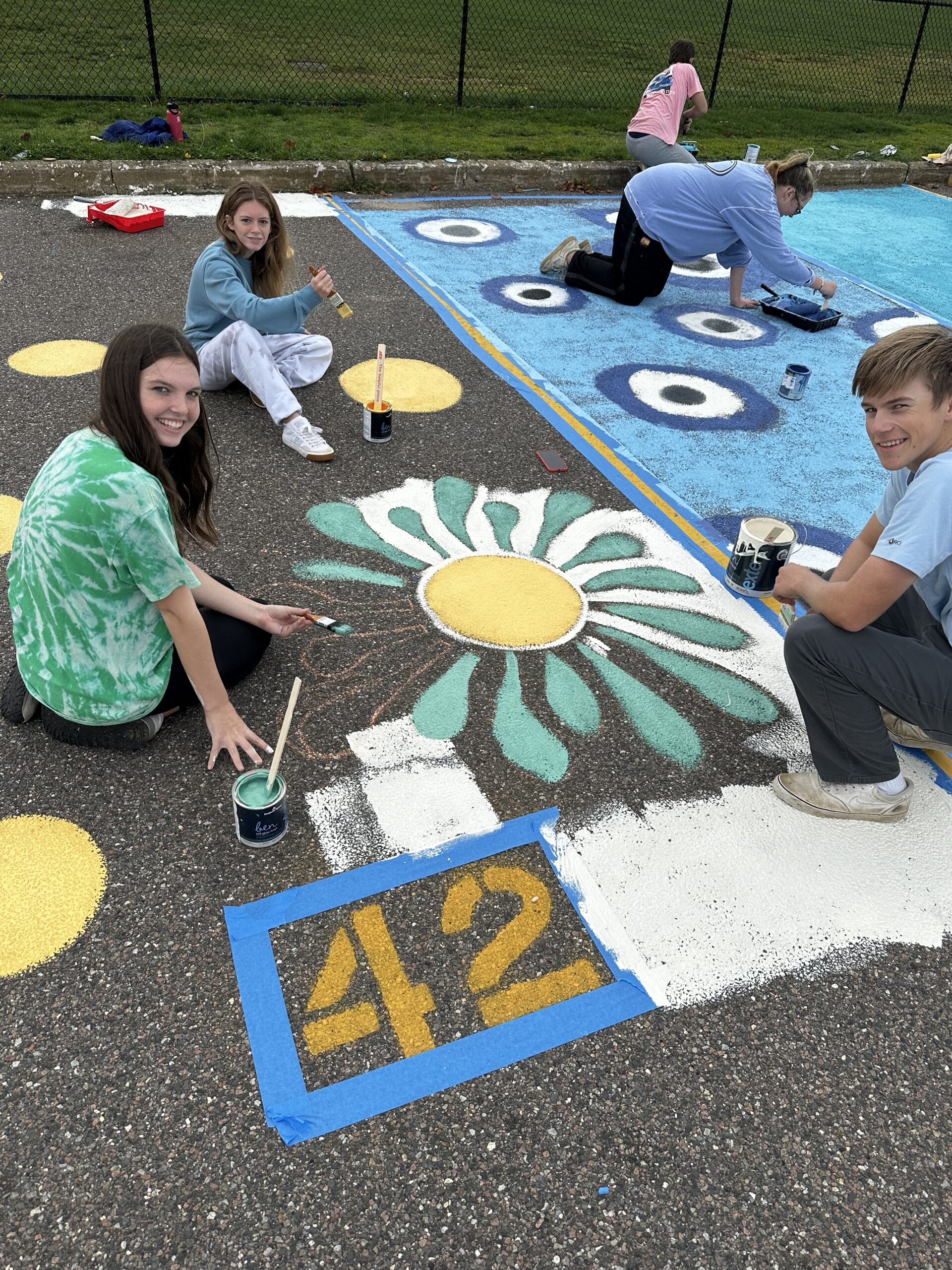 Southampton High School’s Class of 2023 recently painted their own parking spots, bringing school spirit and a colorful vibe to the senior parking lot. The painting opportunity was a first at the high school, and administration and senior class advisers hope it will inaugurate a new tradition. COURTESY SOUTHAMPTON SCHOOL DISTRICT