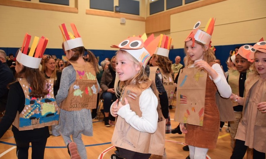 Tuttle Avenue Elementary School first graders participated in a Thanksgiving celebration which gave thanks to all essential workers in their school and the veterans from their community. It was a morning of poetry and song as each of the grade’s classrooms donned turkey and pilgrim headdresses and took to the stage to perform a variety of Thanksgiving holiday music and to recognize the important work that the faculty and staff do each day. COURTESY EASTPORT-SOUTH MANOR SCHOOL DISTRICT