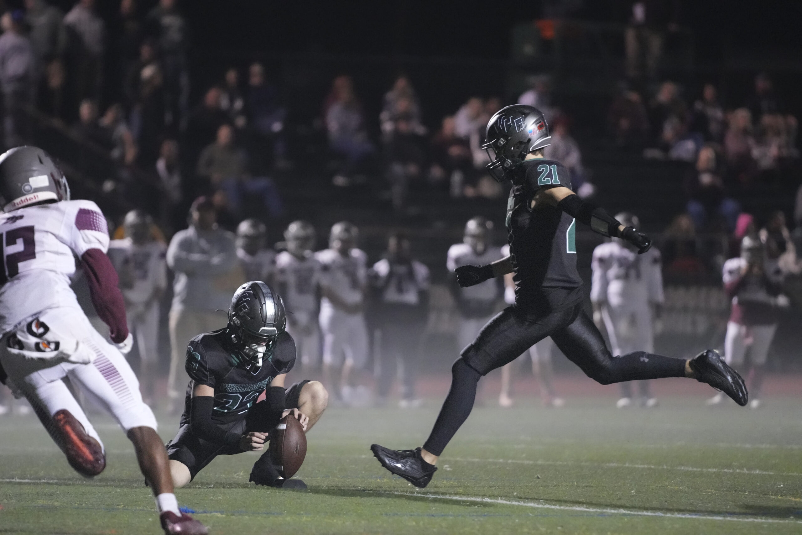 Westhampton Beach sophomore Brody Schaefer kicks an extra point.    RON ESPOSITO