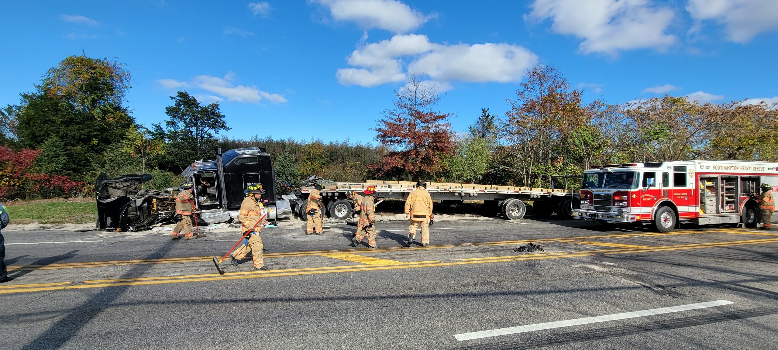 Cleaning up after the November 9 crash on County Road 39 in Southampton.    COURTESY SOUTHAMPTON FIRE DEPARTMENT.