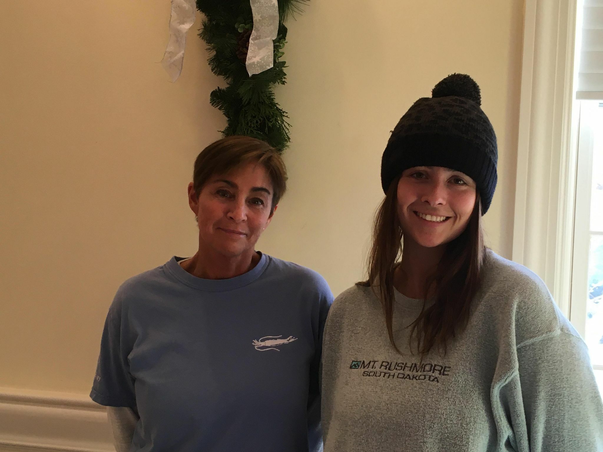 Julie and Olivia Lofstad offer fresh local seafood  at the Catch of The Hamptons table at the indoor winter market in Westhampton Beach.    KITTY MERRILL