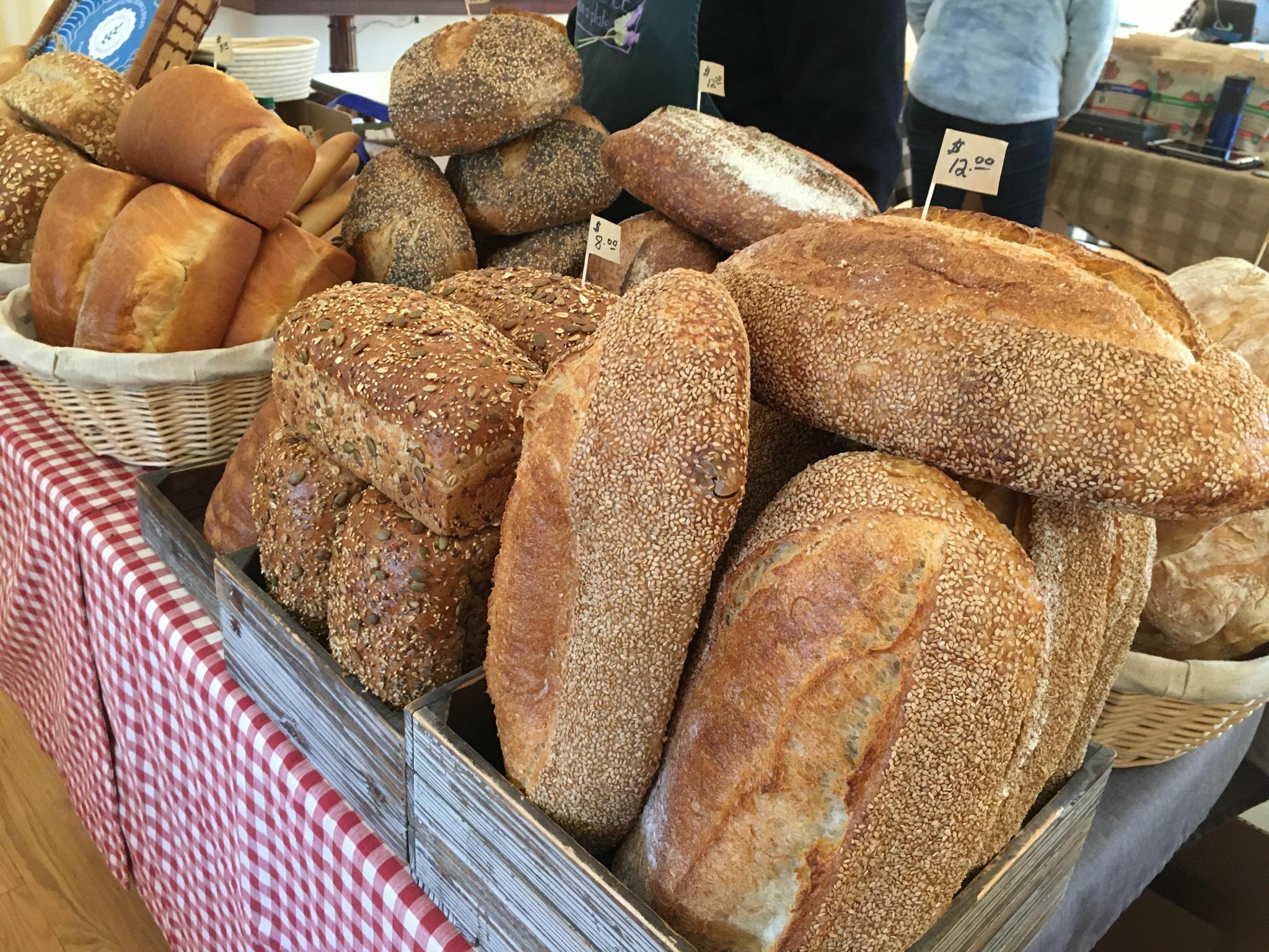 An abundance of fresh and fragrant bread  could be found at the Hampton Born & Bread table at the winter market in Westhampton Beach.    KITTY MERRILL