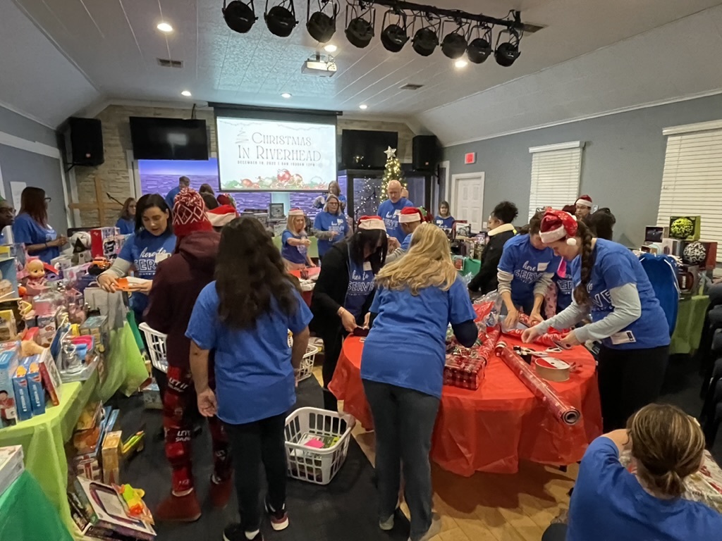 On December 10, Blaze Church distributed 250 new toys to local families, through a partnership with Roanoke Elementary School and Riverhead Middle School. The social workers provided 10 families from each of these schools that would benefit from the display of compassion. More than 70 children received gifts. Blaze Church members went shopping for the toys and Hampton Bays library collected toys during the month of November and donated them. Church members also purchased toys directly off a registry. All the remaining toys will be given to Phillips Avenue Elementary School and Riley Avenue Elementary School. COURTESY BLAZE CHURCH