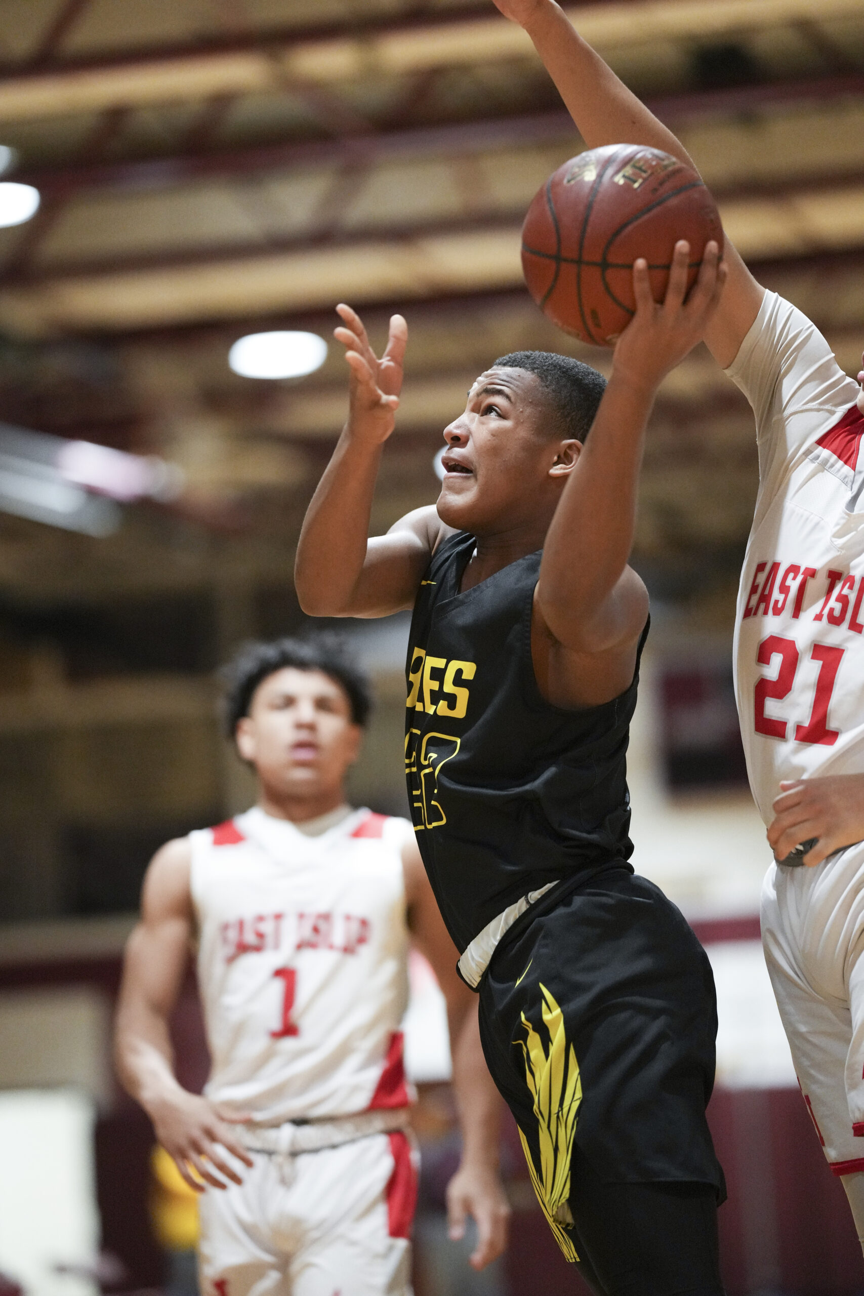 Bridgehampton junior Mikhail Feaster goes up with the ball.   RON ESPOSITO