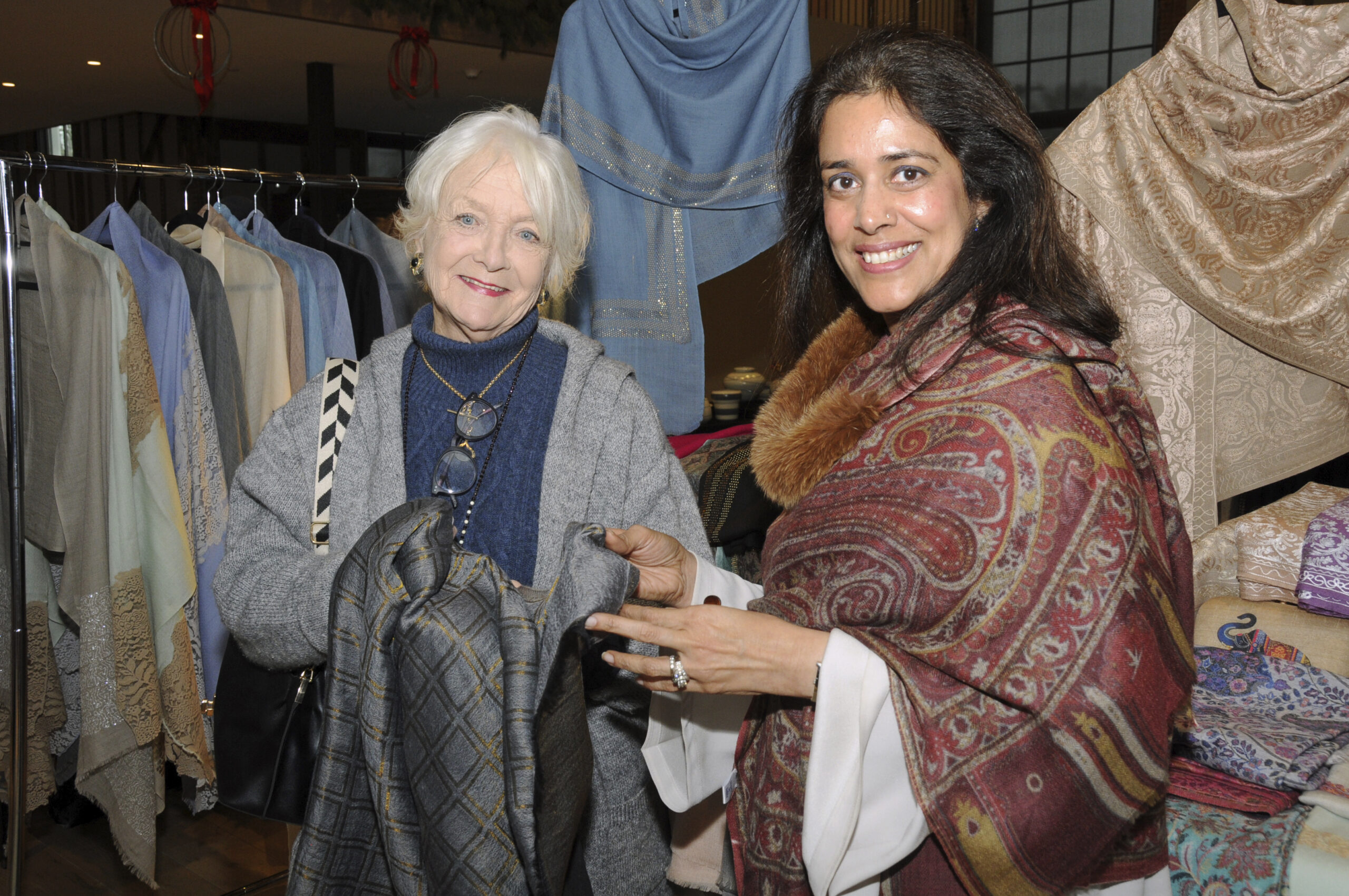 Nancy Achenbach with Sonika Nanda from Shawls by Sonika at the second annual Maker's Market at  The Church in Sag Harbor on Saturday.   RICHARD LEWIN