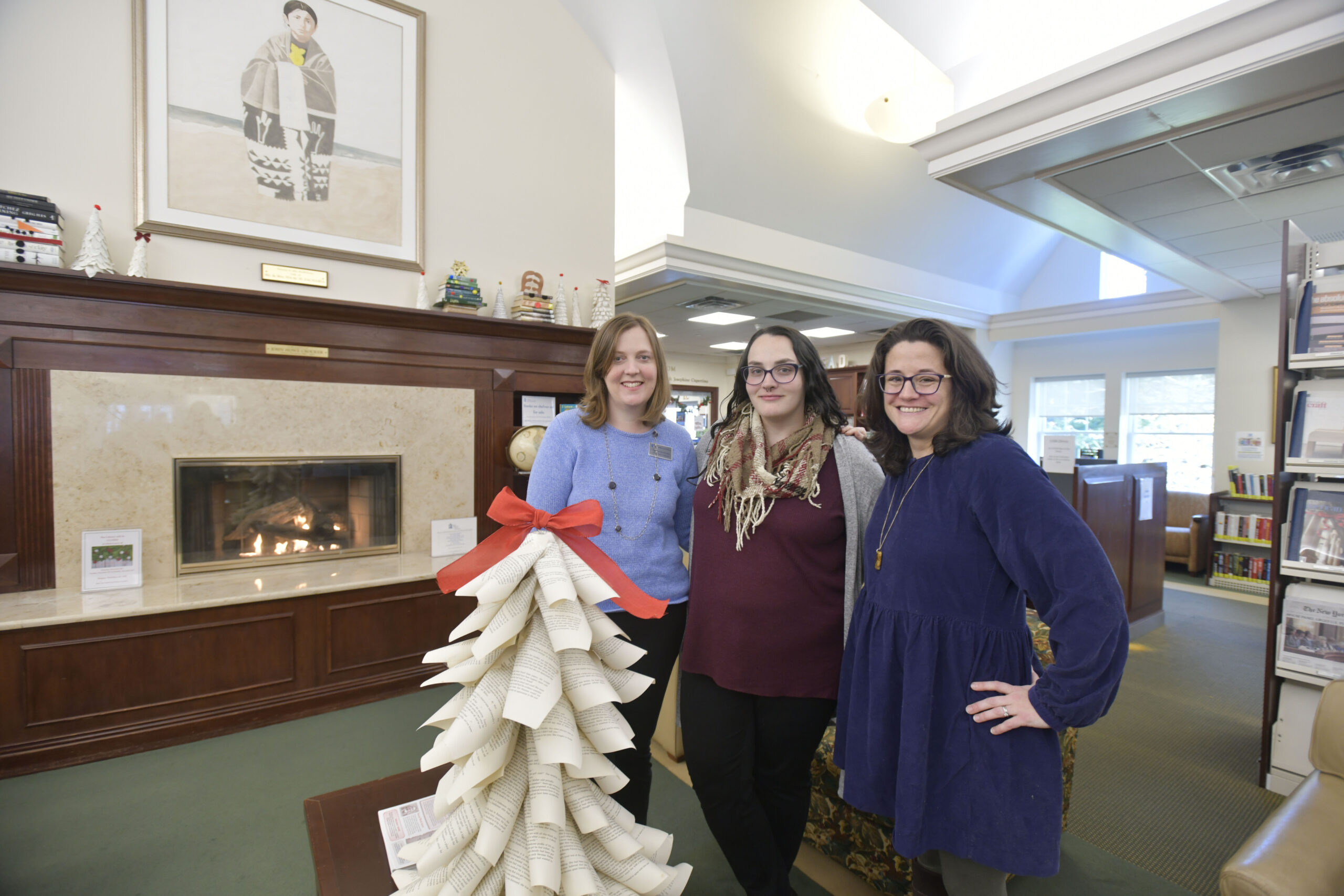 The elves responsible for the decorations at the Rogers Memorial Library, left to right, Joanna Anderson Mayra Scanlon and Sara Fiore.   DANA SHAW