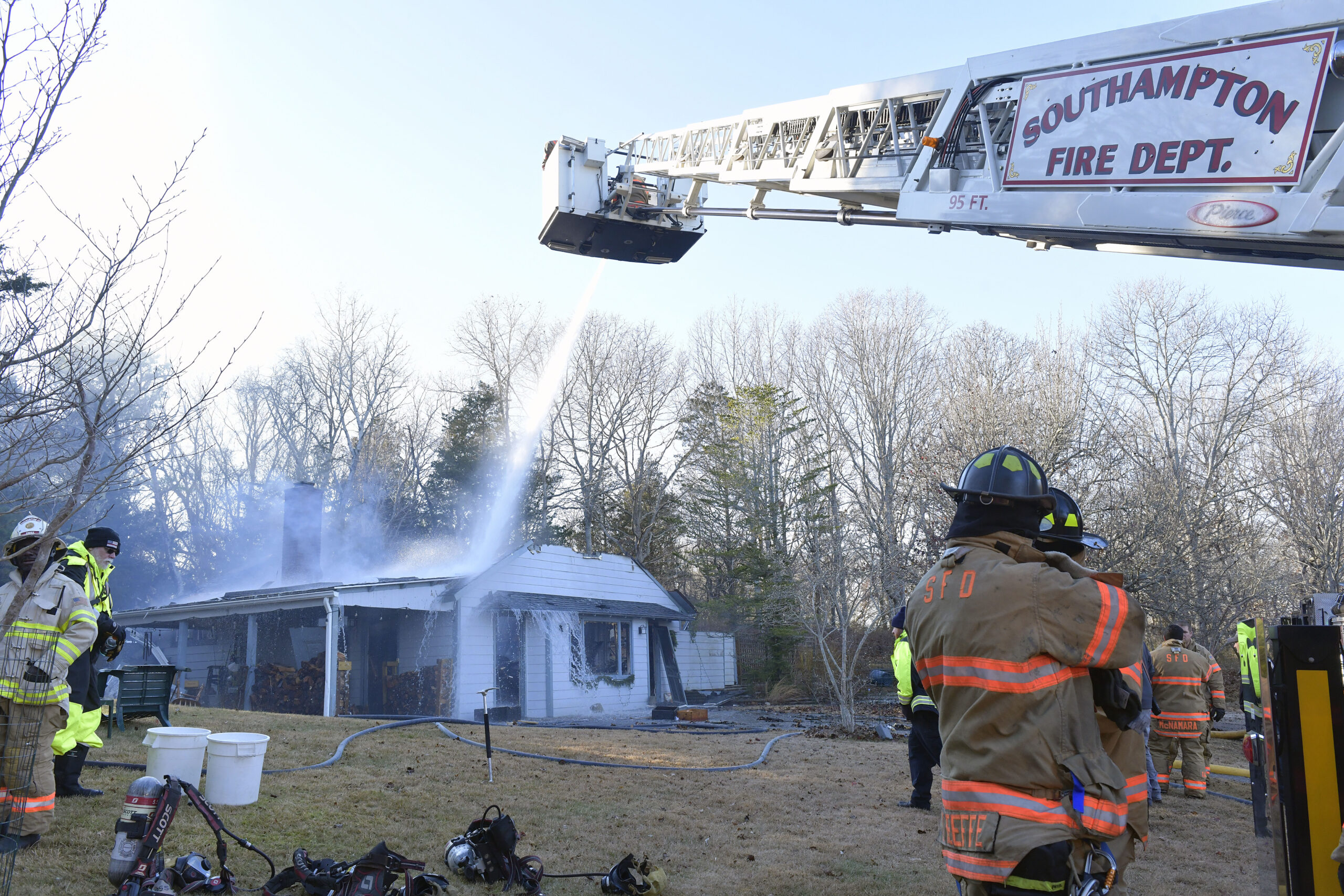 Firefighters respond to an early afternoon structure fire on Tuesday in Tuckahoe.   DANA SHAW