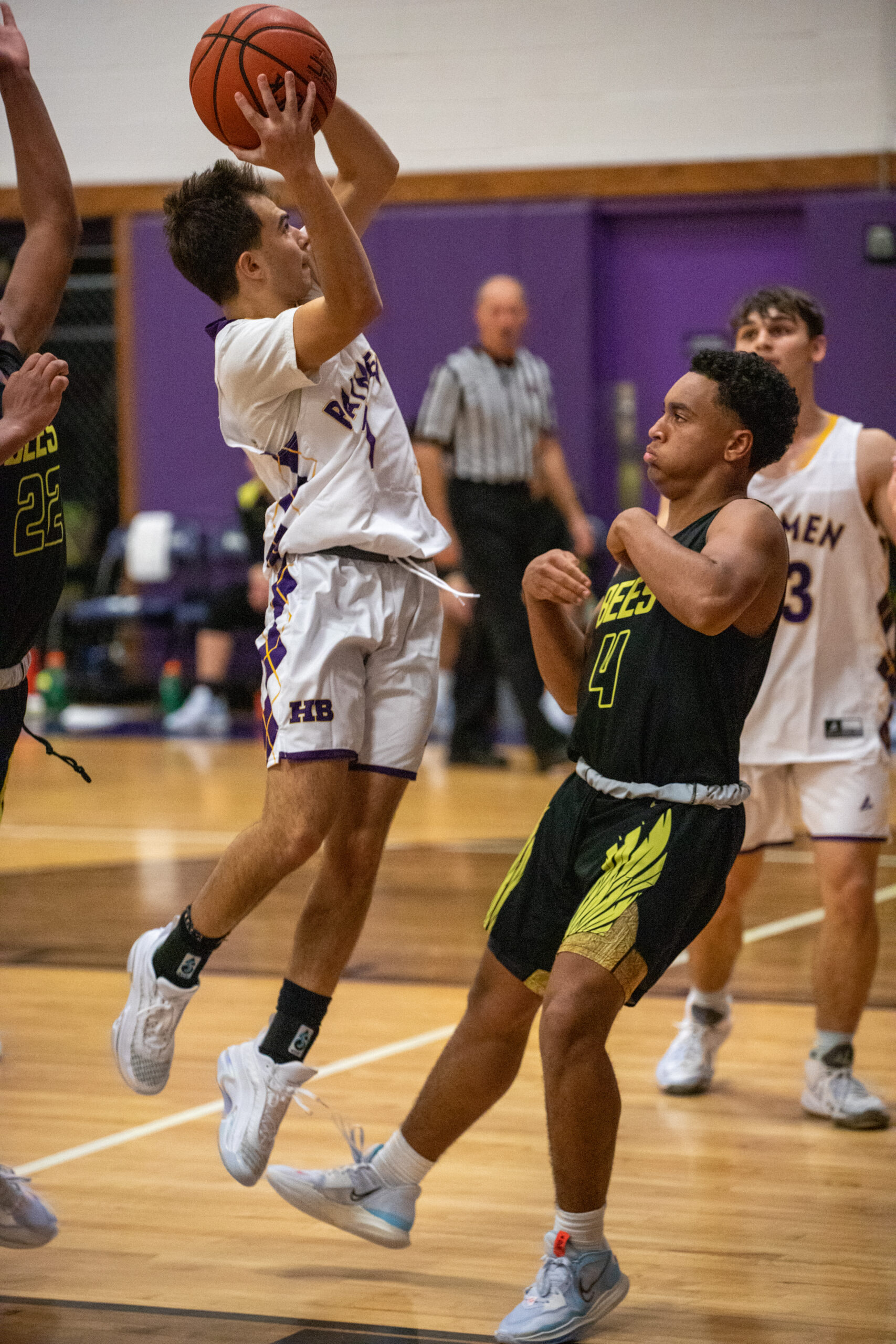 Hampton Bays senior Gianni Scotto shoots over Bridgehampton freshman Alex Davis.    MICHAEL O'CONNOR