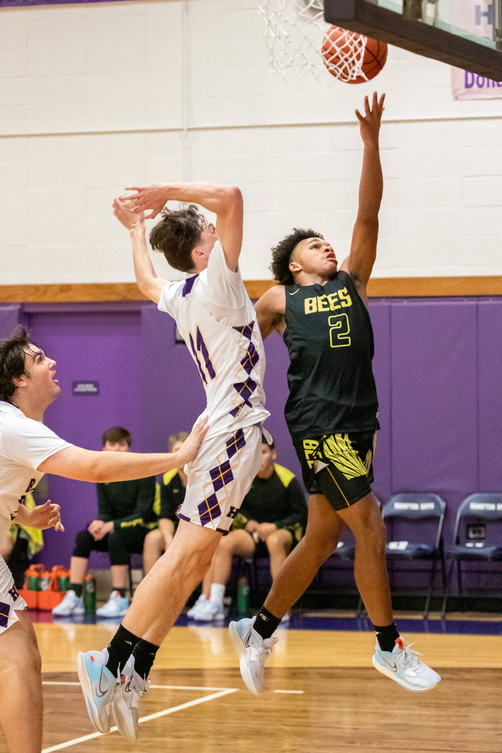 Bridgehampton's Jai Feaster scores off a left-handed layup. The freshman came off the bench on November 30 to score a team-high 19 points.   MICHAEL O'CONNOR