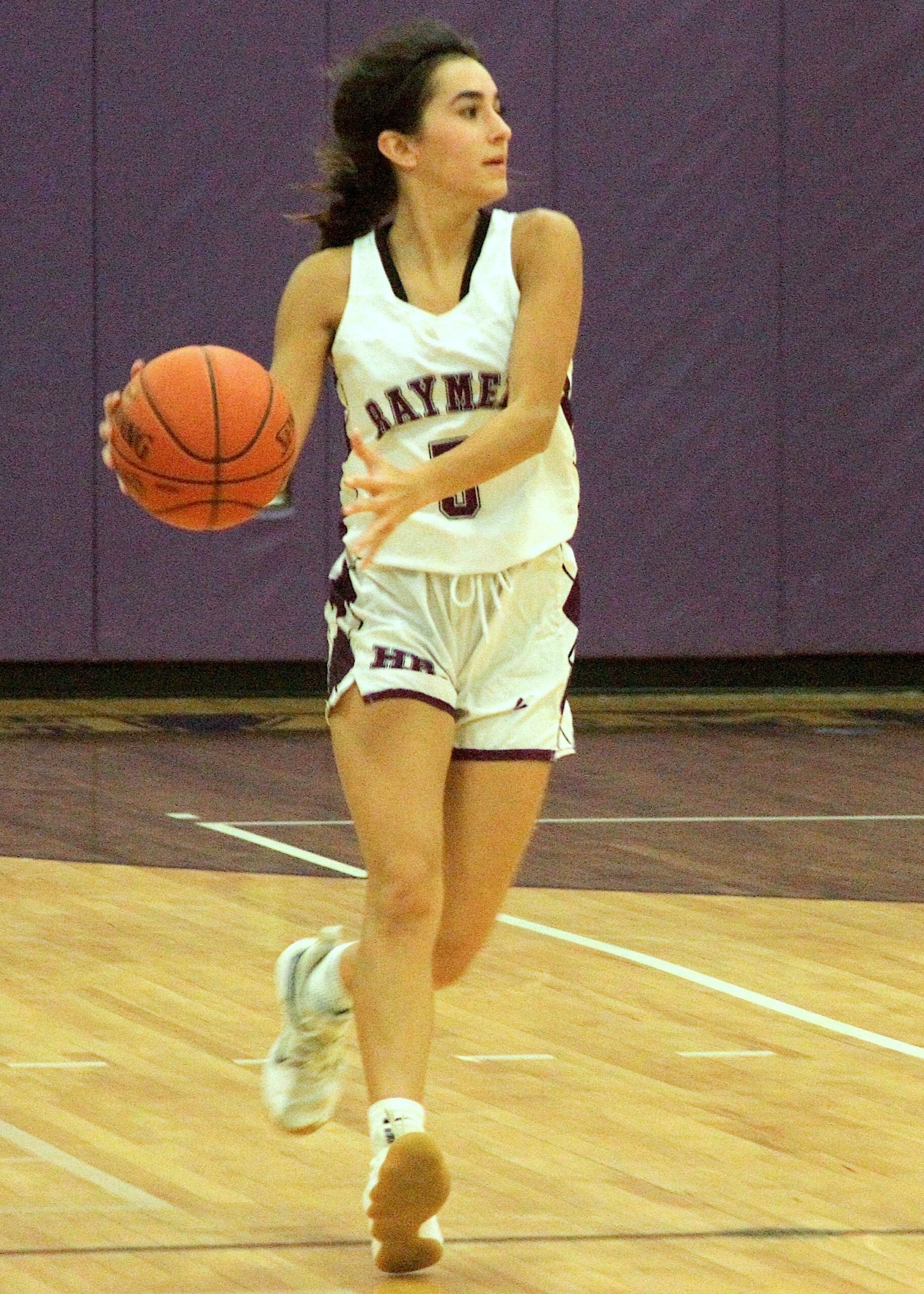 Senior guard Sophia Corredor makes a pass in transition. DESIRÉE KEEGAN