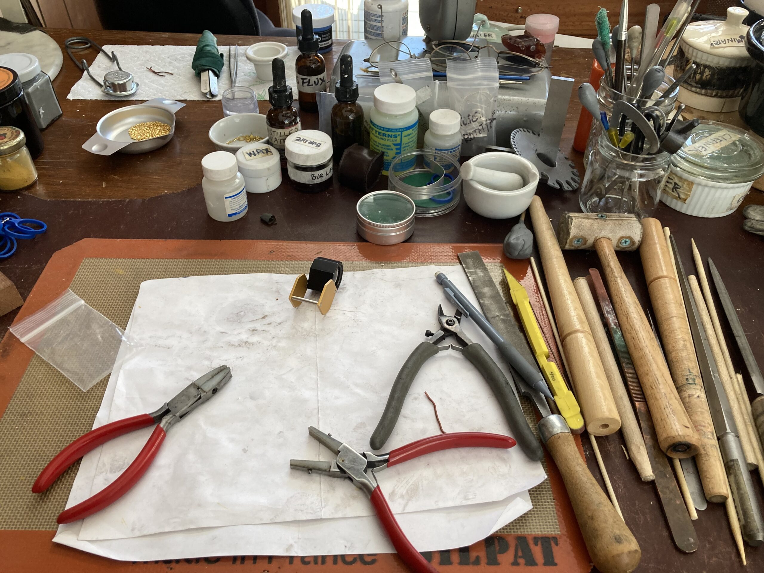 Tools ready to be put to use in Lois Gore's workspace.