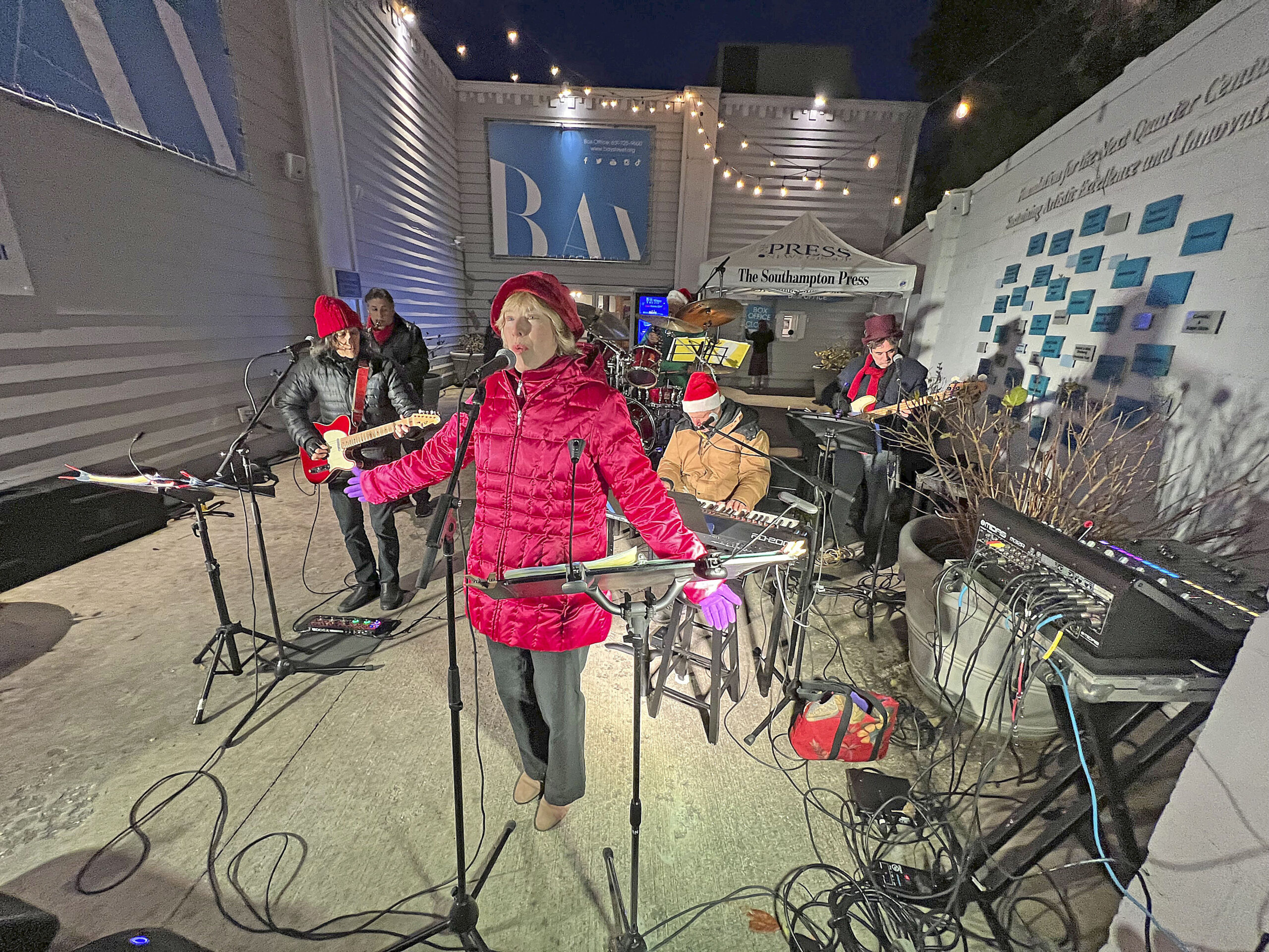 Sarah Conway and the Playful Souls perform for the crowd at the Sag Harbor tree lighting on Friday.