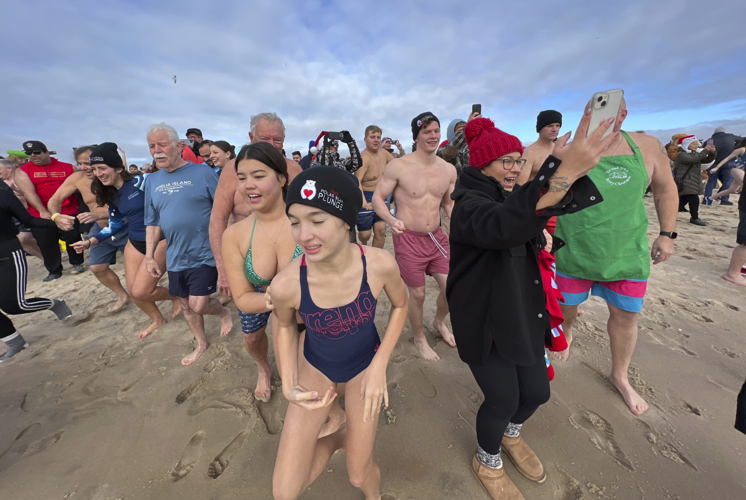 Brave souls participated in the annual Polar Bear Plunge at Coopers Beach on Saturday morning to benefit Heart of the Hamptons.  DANA SHAW