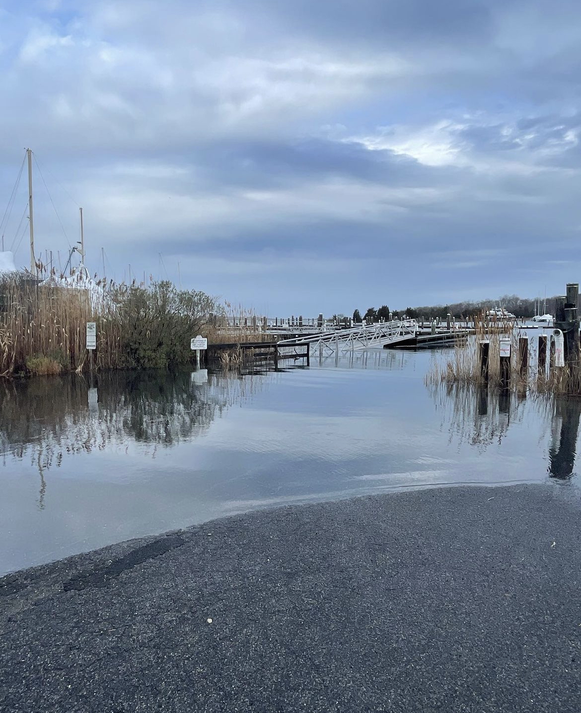 Thursday's storm surge floods the Three Mile Harbor Marina in Springs.