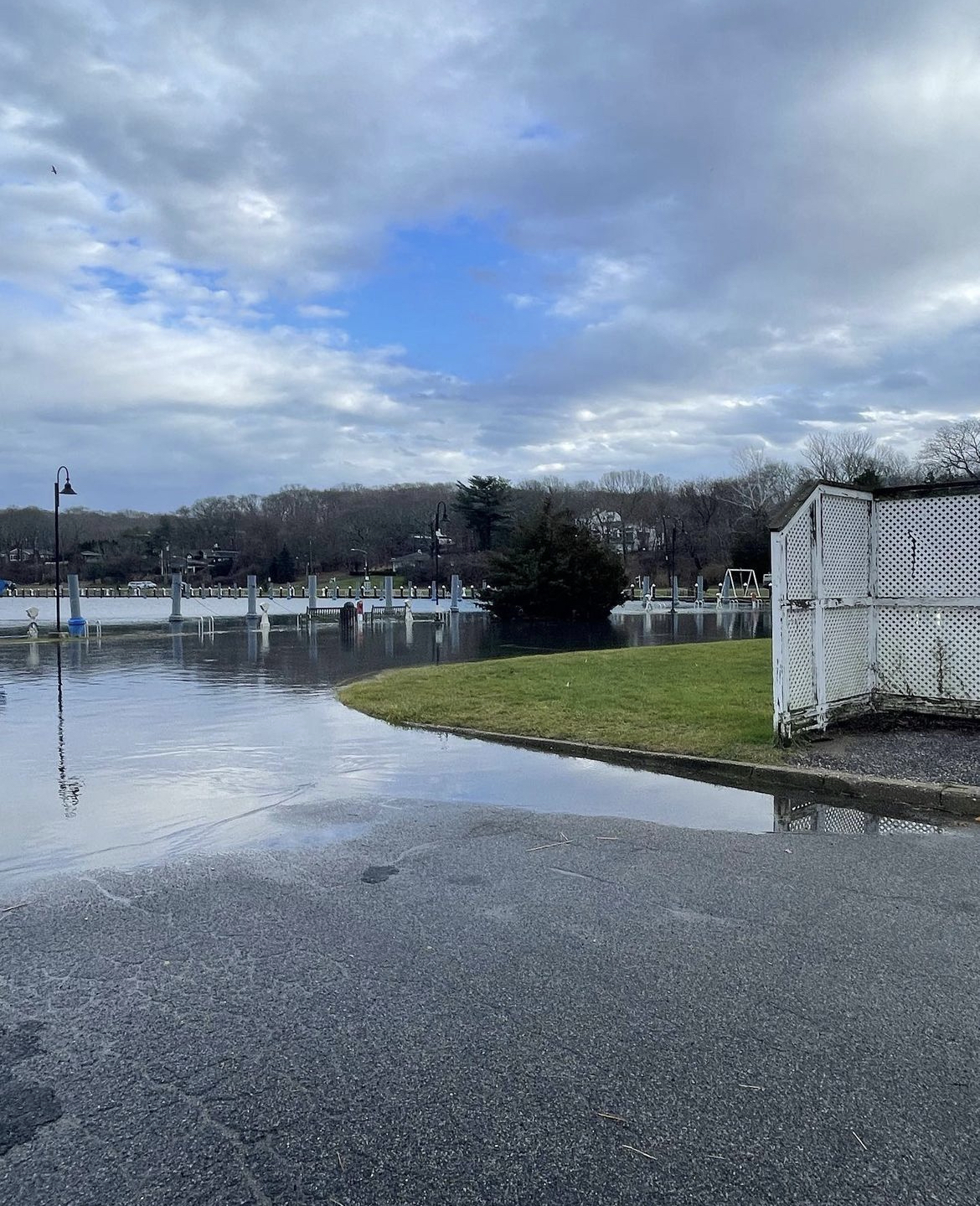 Thursday's storm surge floods the Three Mile Harbor Marina in Springs.