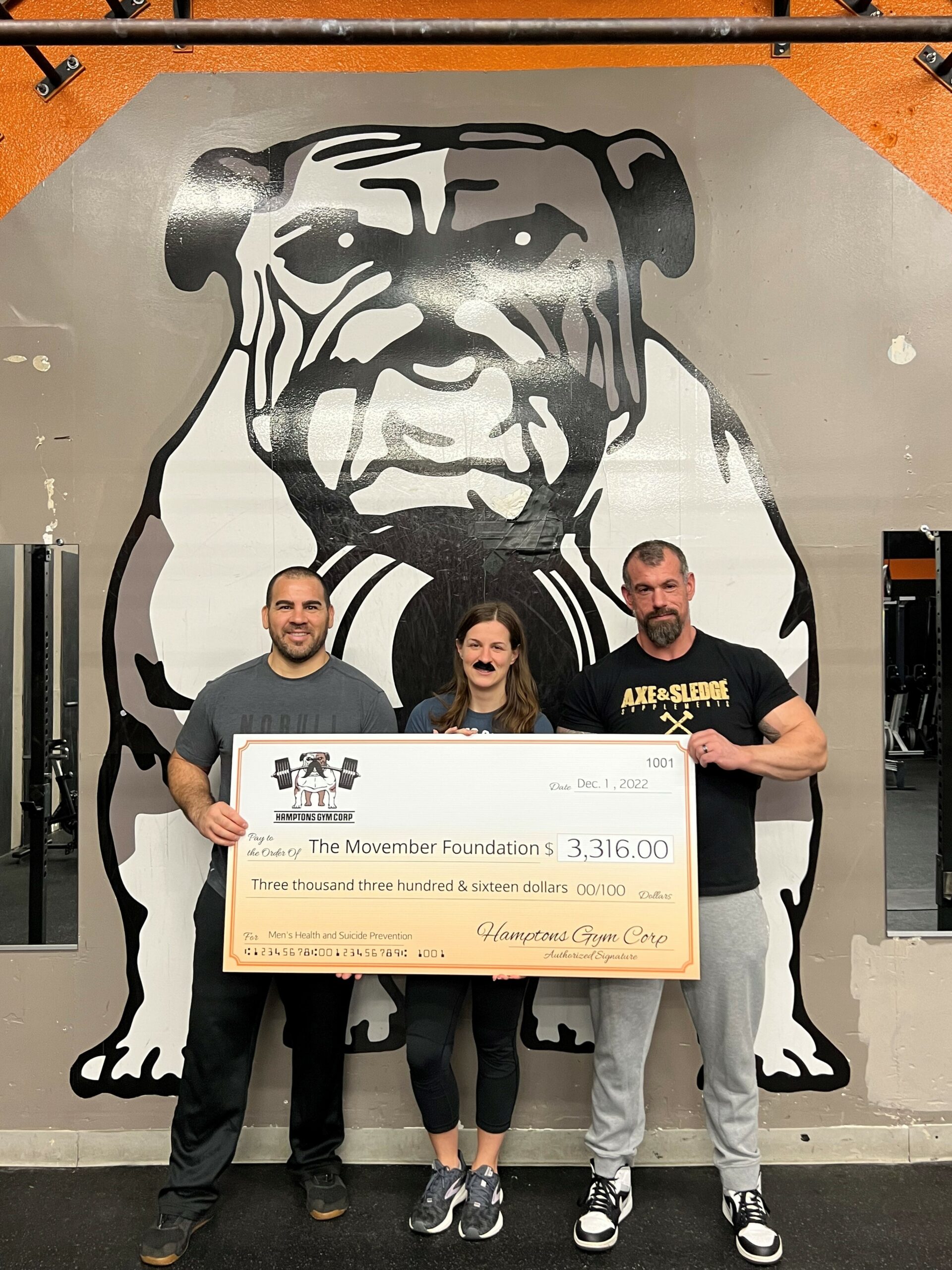 Head Crossfit11968 coach Ralph Ruiz, and Jocelin Kalish and Mike MacNamara of Hamptons Gym Corp, helped raise $2,316 in support of the Movember Foundation. The Movemeber Foundation is making a difference in mental health and suicide prevention, prostate and testicular cancers. COURTESY HAMPTONS GYM CORP