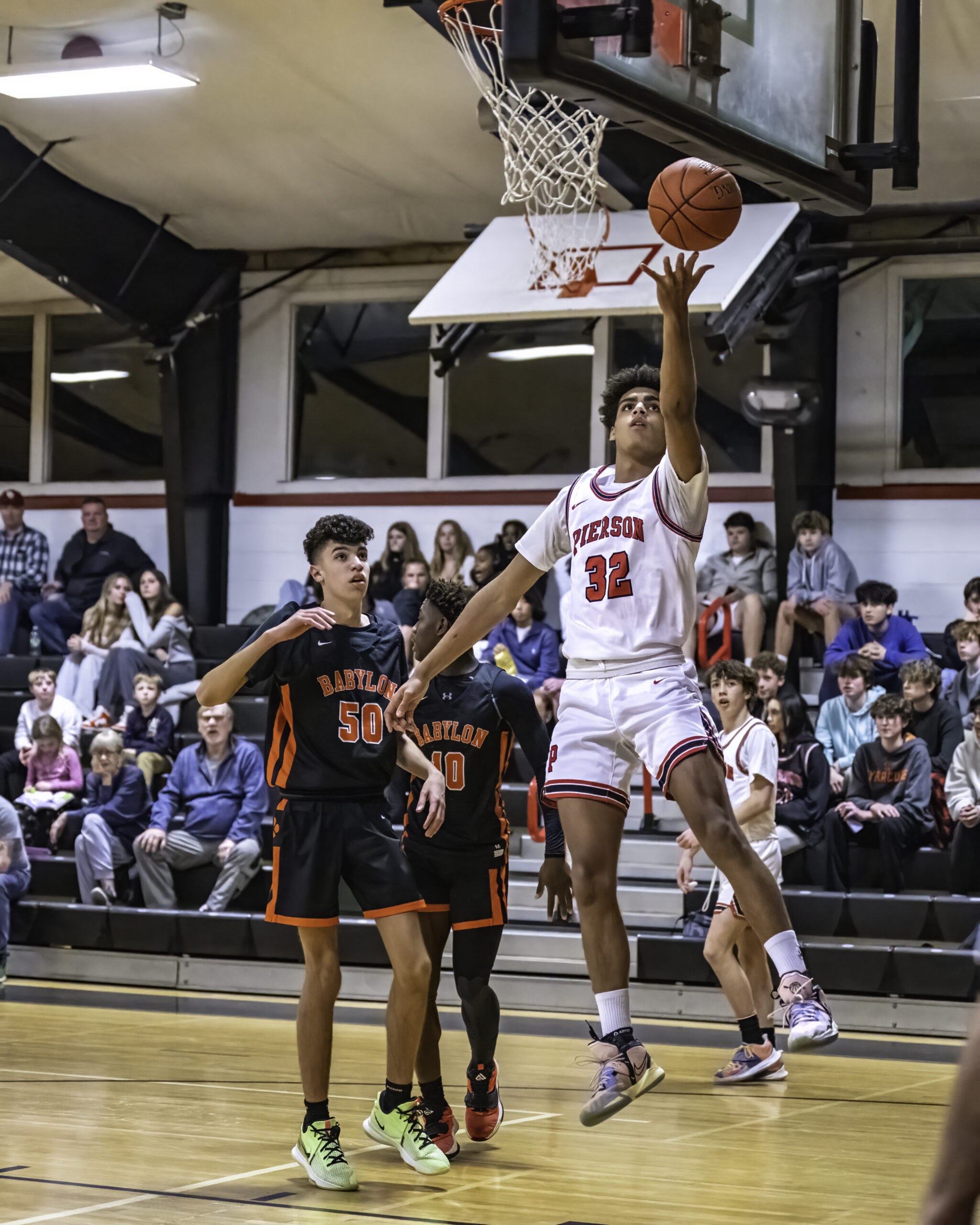 Junior Charlie McLean scores on a layup in the third quarter. MARIANNE BARNETT