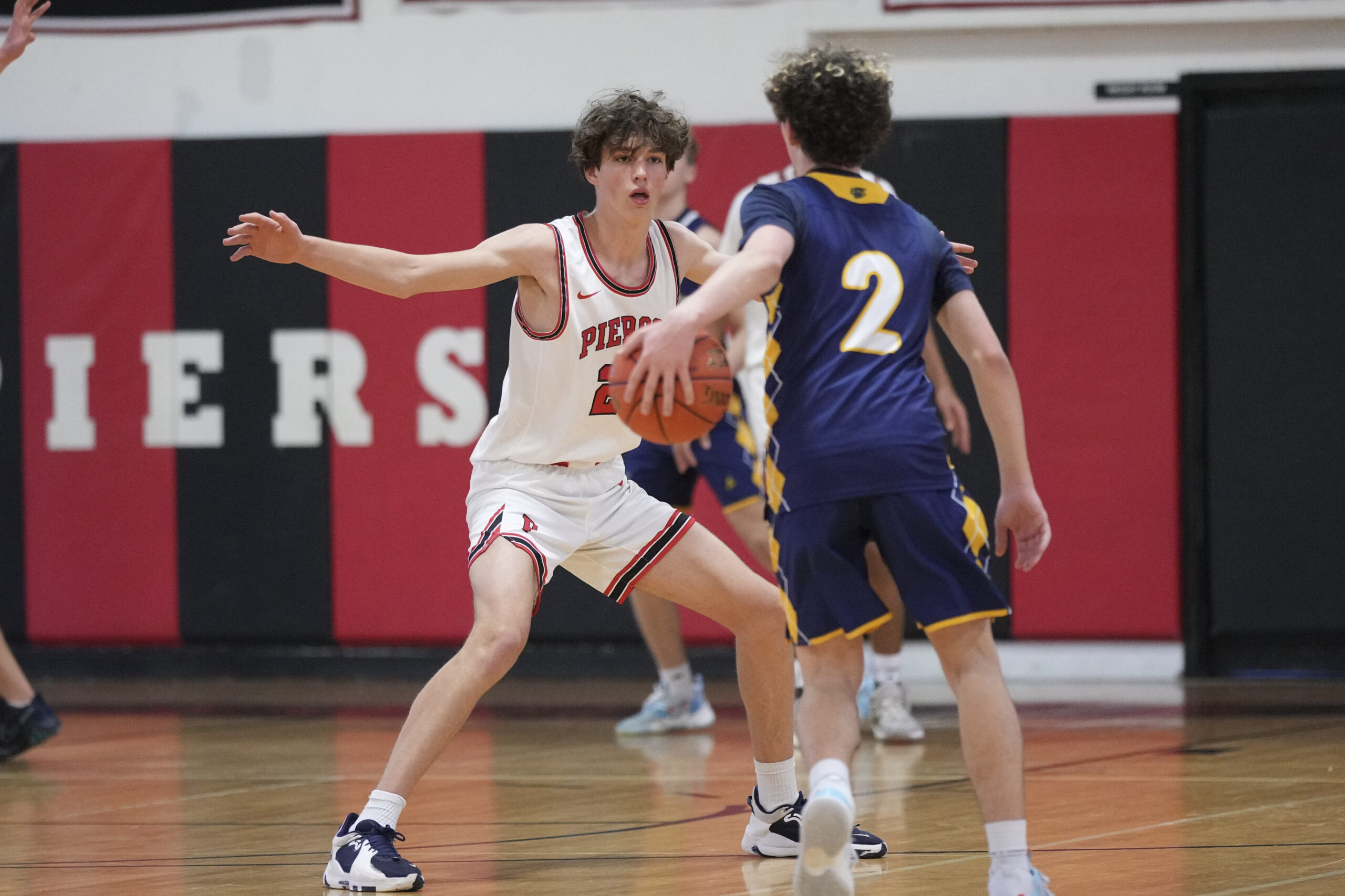 Pierson's Kyle Seltzer covers Shoreham's Alex Makarewicz.    RON ESPOSITO