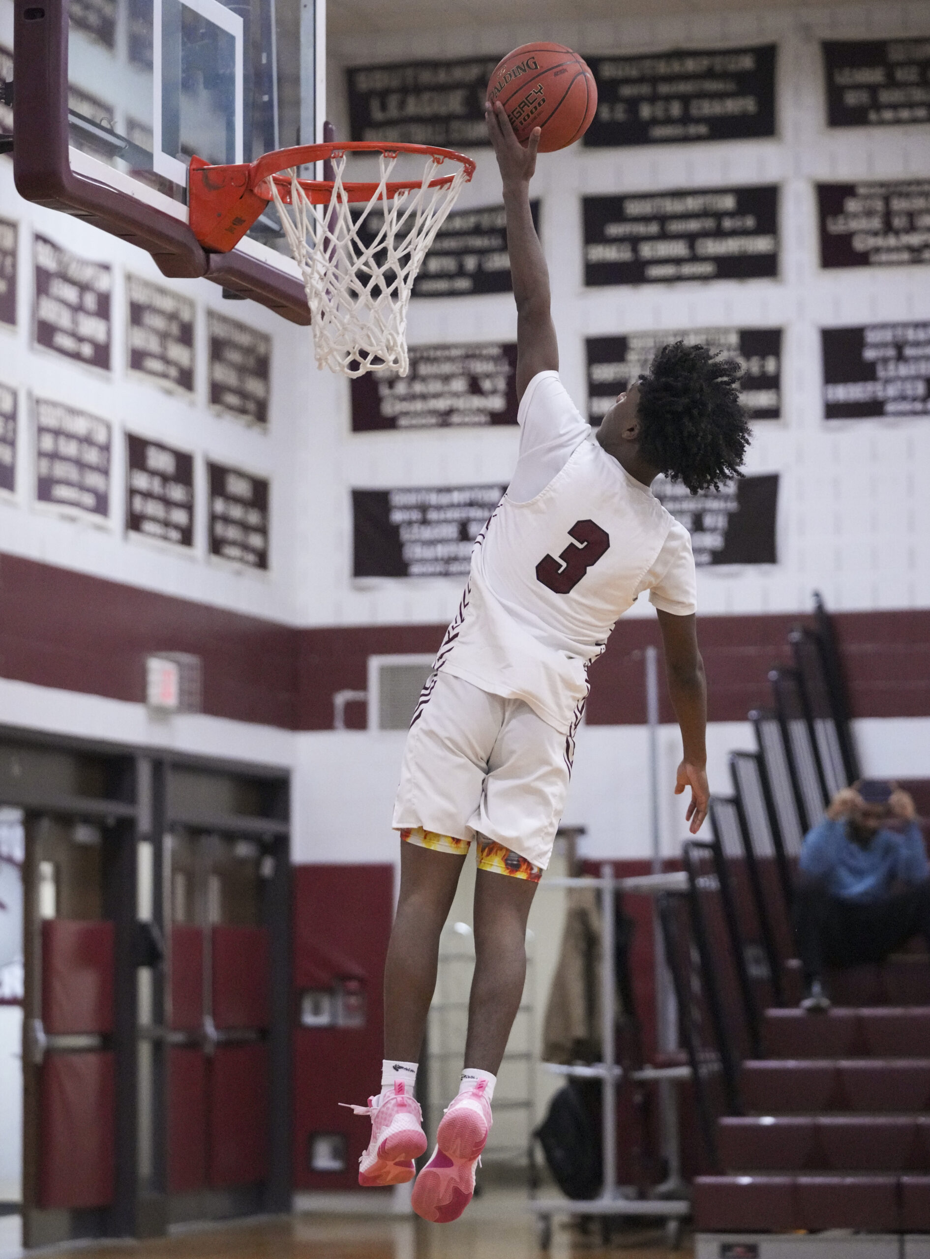 Southampton's Derek Reed scores all alone on a fast break. Reed scored 18 points alone in the third quarter on Saturday night.   RON ESPOSITO