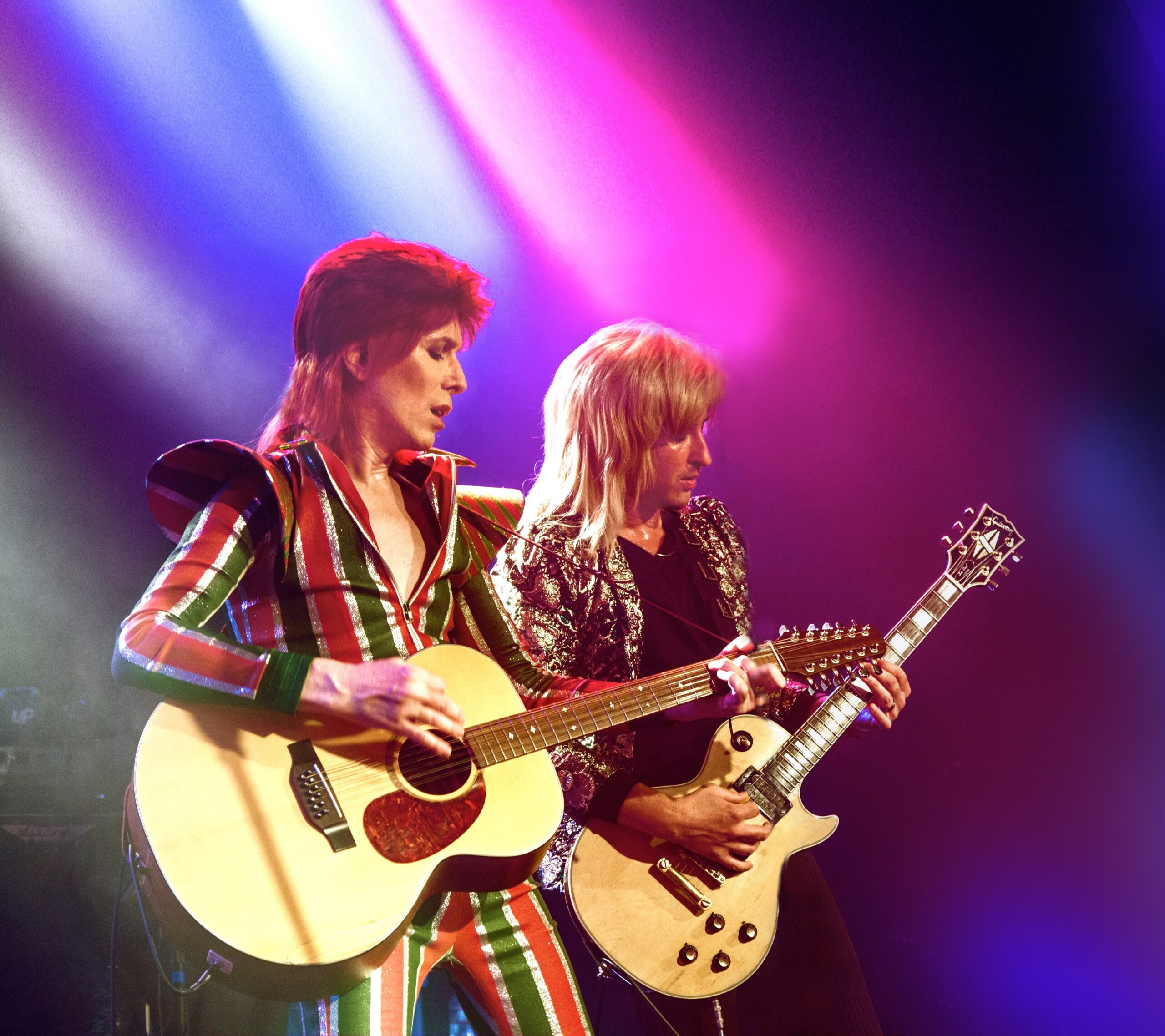 David Brighton performing with lead guitarist and background vocalist Switch in 