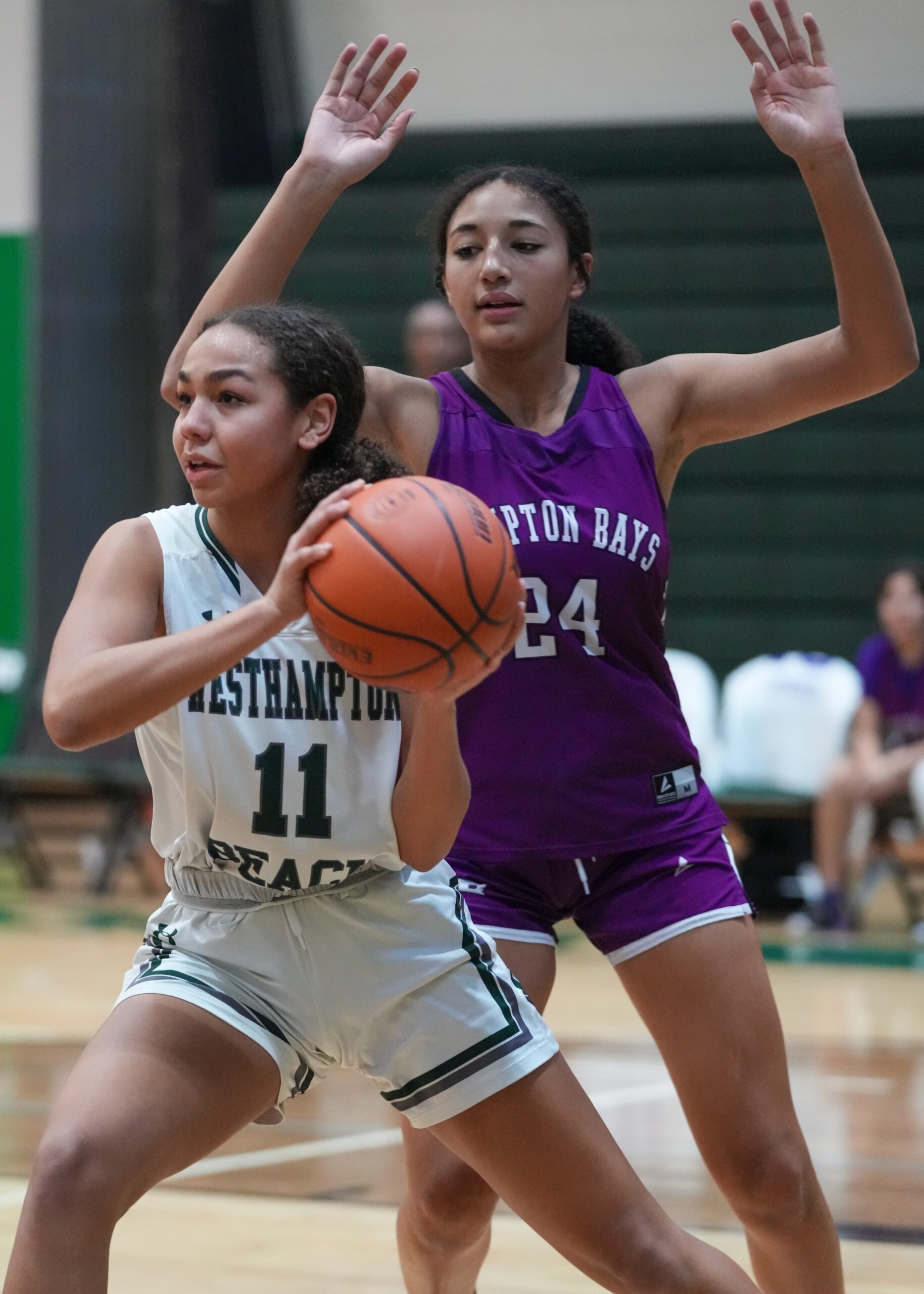 Westhampton Beach freshman Jasmine Taylor moves the ball under the basket. RON ESPOSITO
