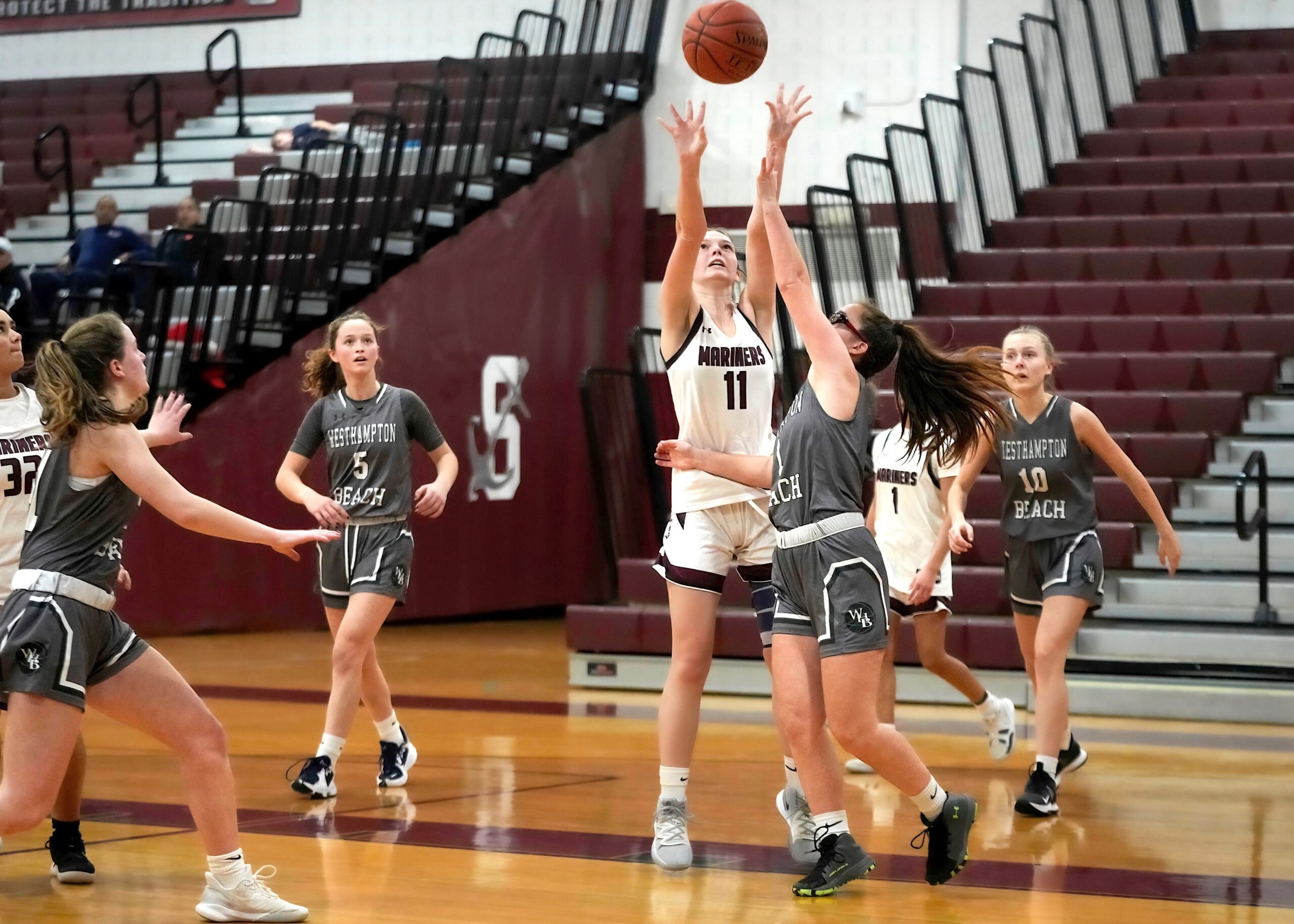 Southampton senior Hailey Cameron shoots over a block attempt. RON ESPOSITO