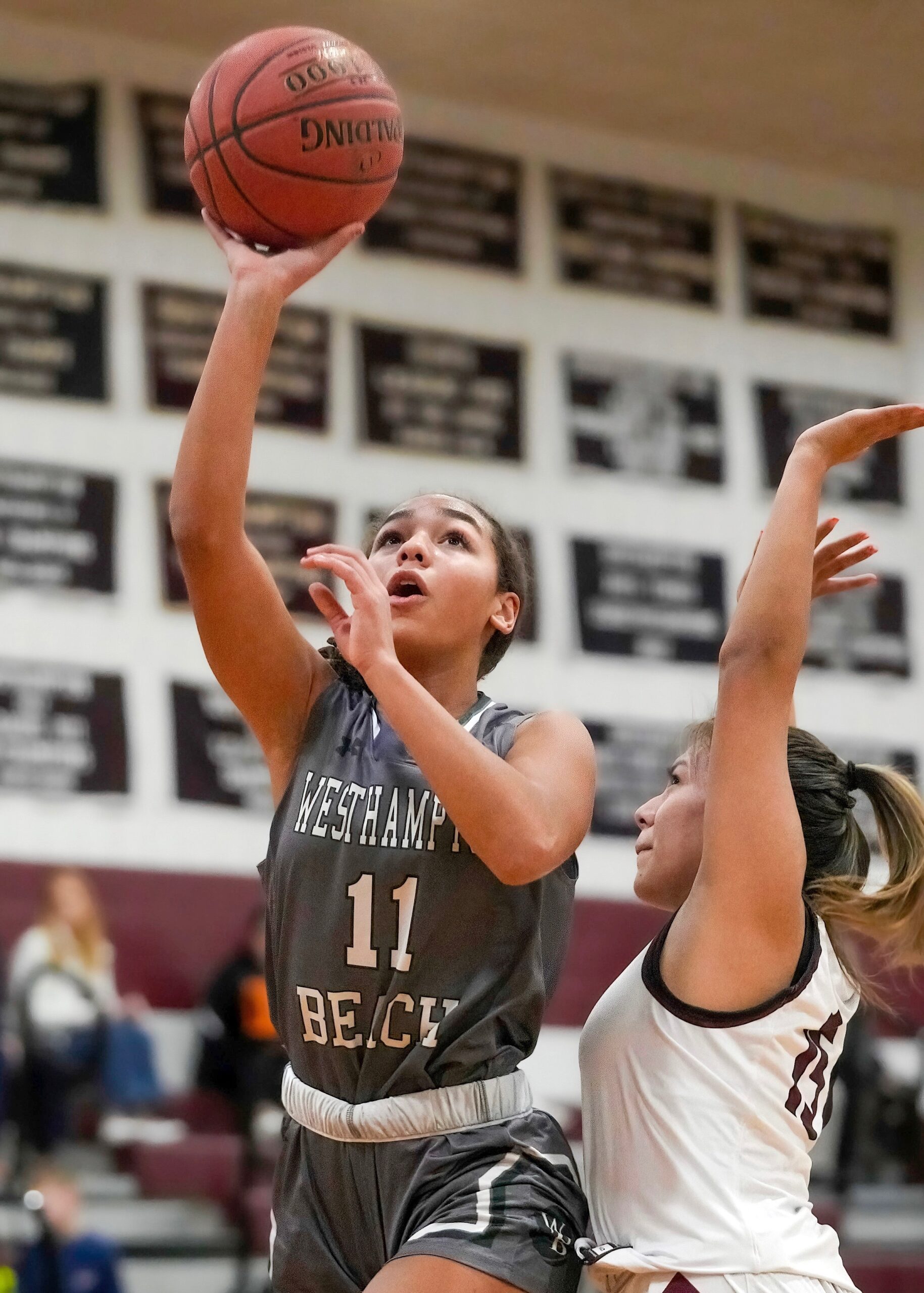 Westhampton Beach freshman Jasmine Taylor scores on a layup. RON ESPOSITO