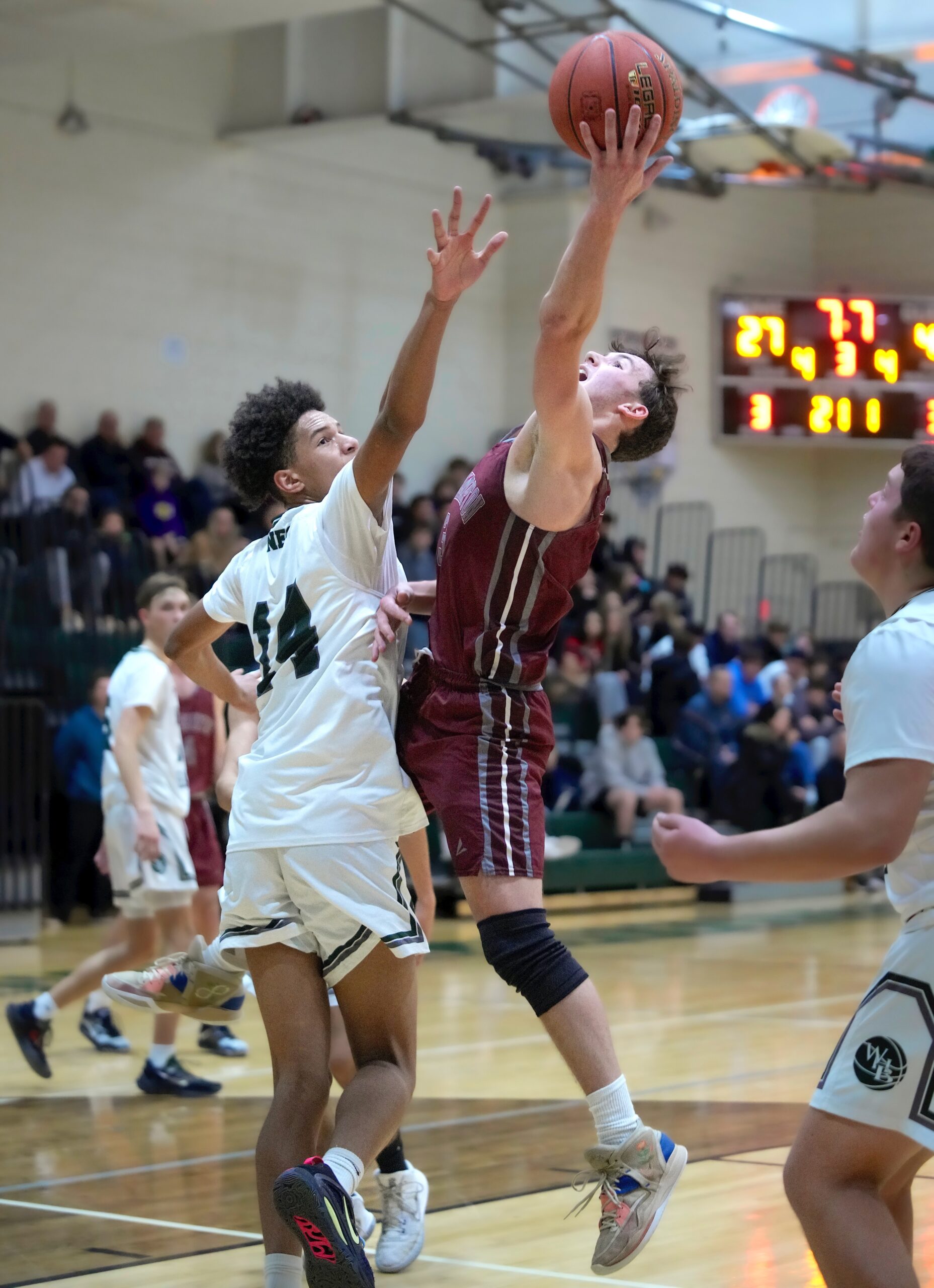 Sophomore Jorden Bennett reaches for a block in a previous game against East Hampton. RON ESPOSITO