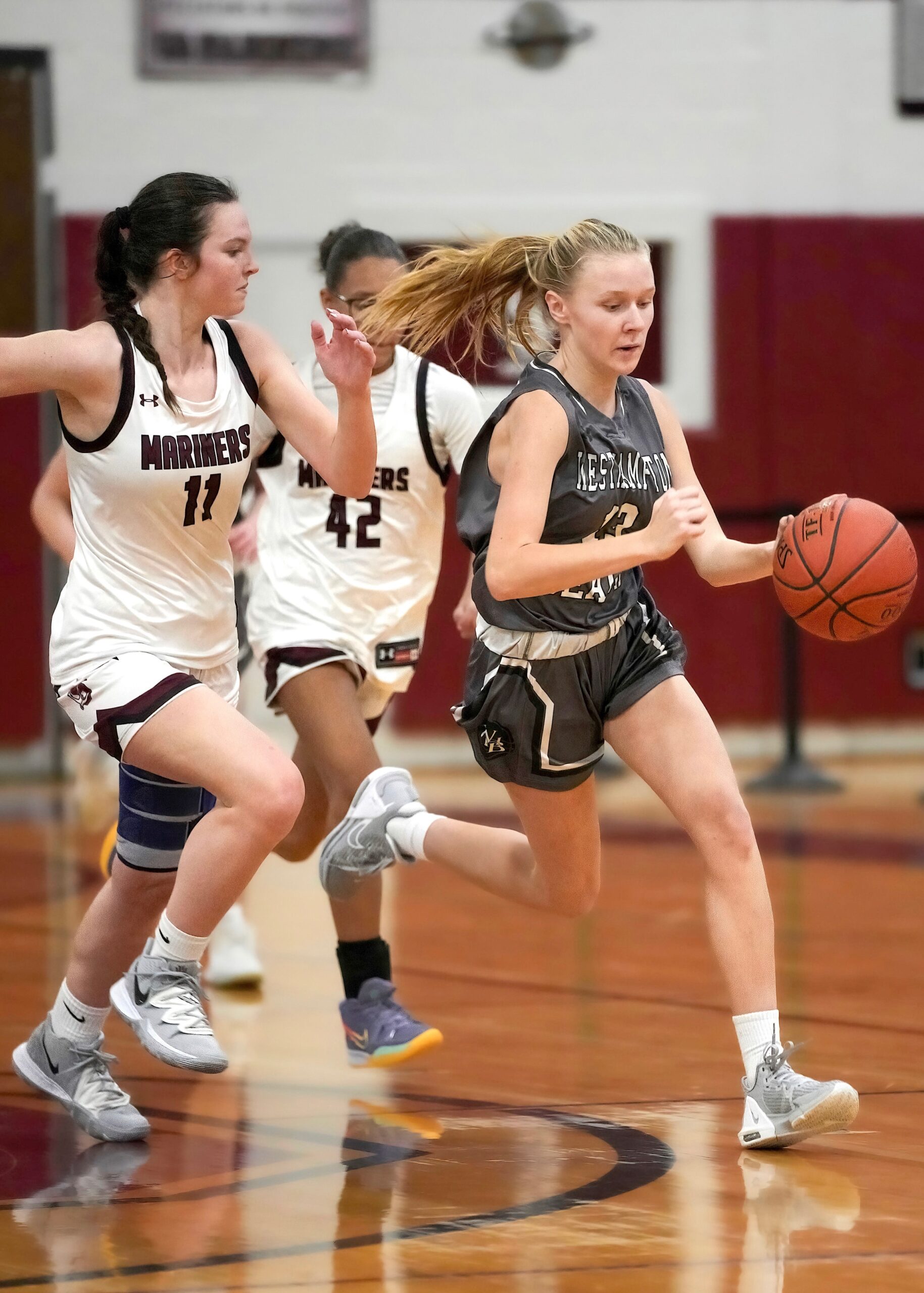 Westhampton Beach eighth-grader Kate Sweet dribbles the ball down the sideline. RON ESPOSITO