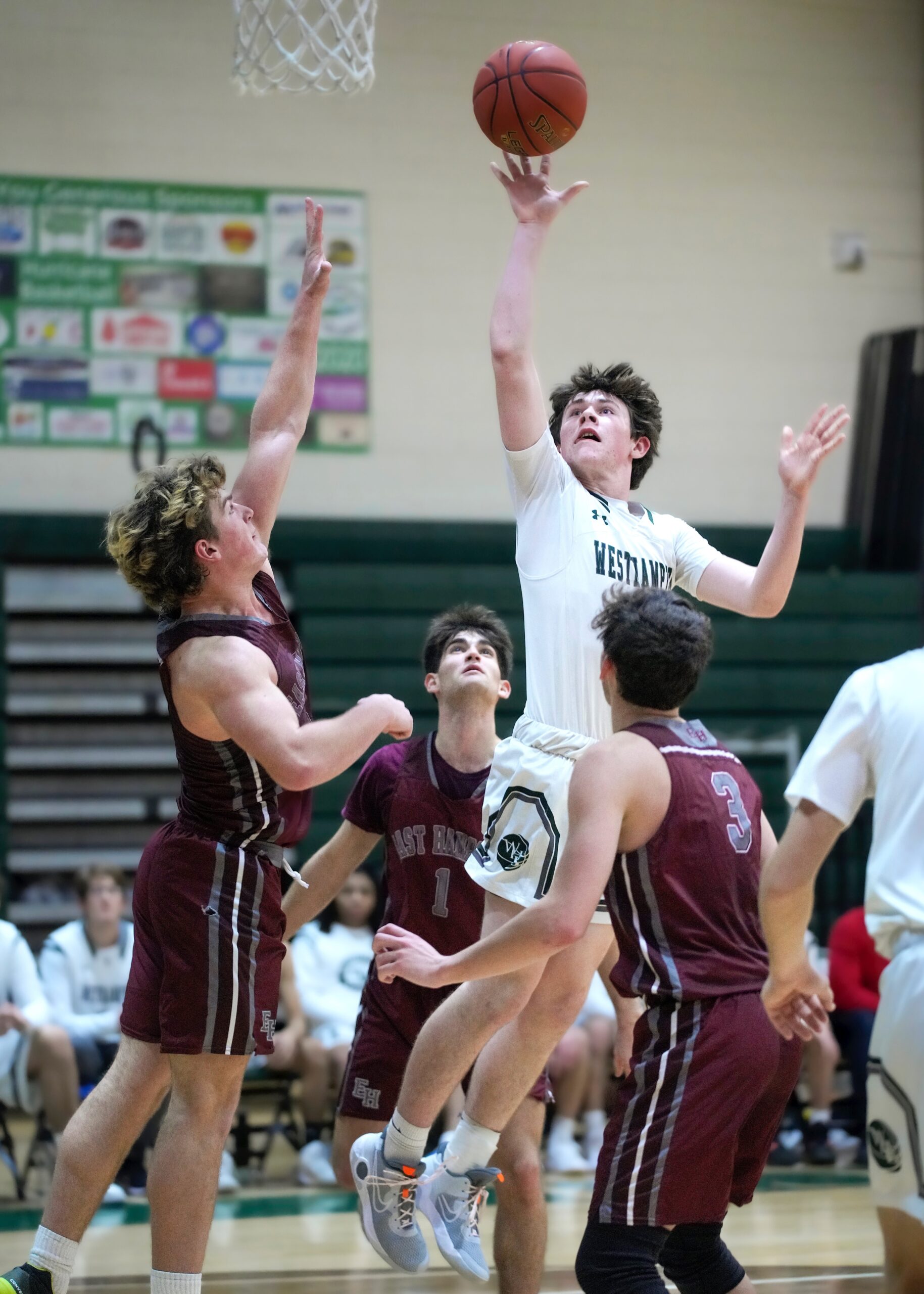 Though getting injured late in the first half senior Quinn McCormack finished with 13 points in Westhampton Beach's loss to North Shore December 29. RON ESPOSITO