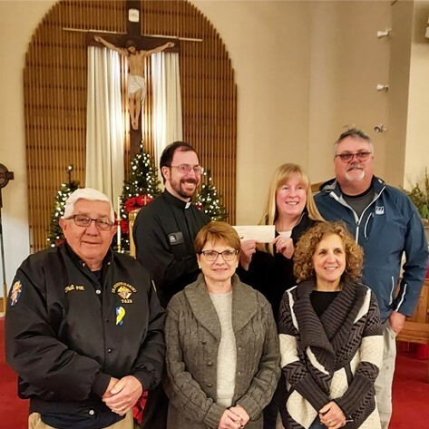 The Church of the Immaculate Conception's food pantry was the recipient of a donation from three service organizations -- the Westhampton Rotary Club, the Joseph Slomski Knights of Columbus Council, and the Westhampton Kiwanis Club. From left, Phil Debrita (Knights of Columbus); Father Mike Bartholomew; Becky Wiseman (Rotary) Beth Hard (Rotary); and Matson Hard (Kiwanis).  COURTESY JOSEPH SLOMSKI KNIGHTS OF COLUMBUS COUNCIL